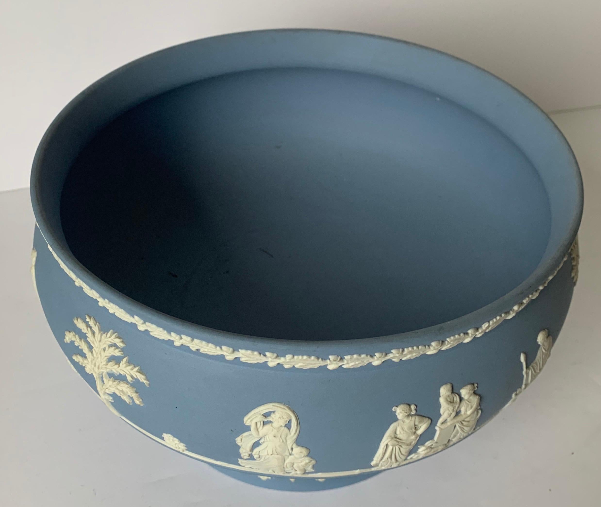 1970 Wedgwood jasperware footed bowl. Light blue jasperware with all-over white neoclassical motif. Signed on the underside.