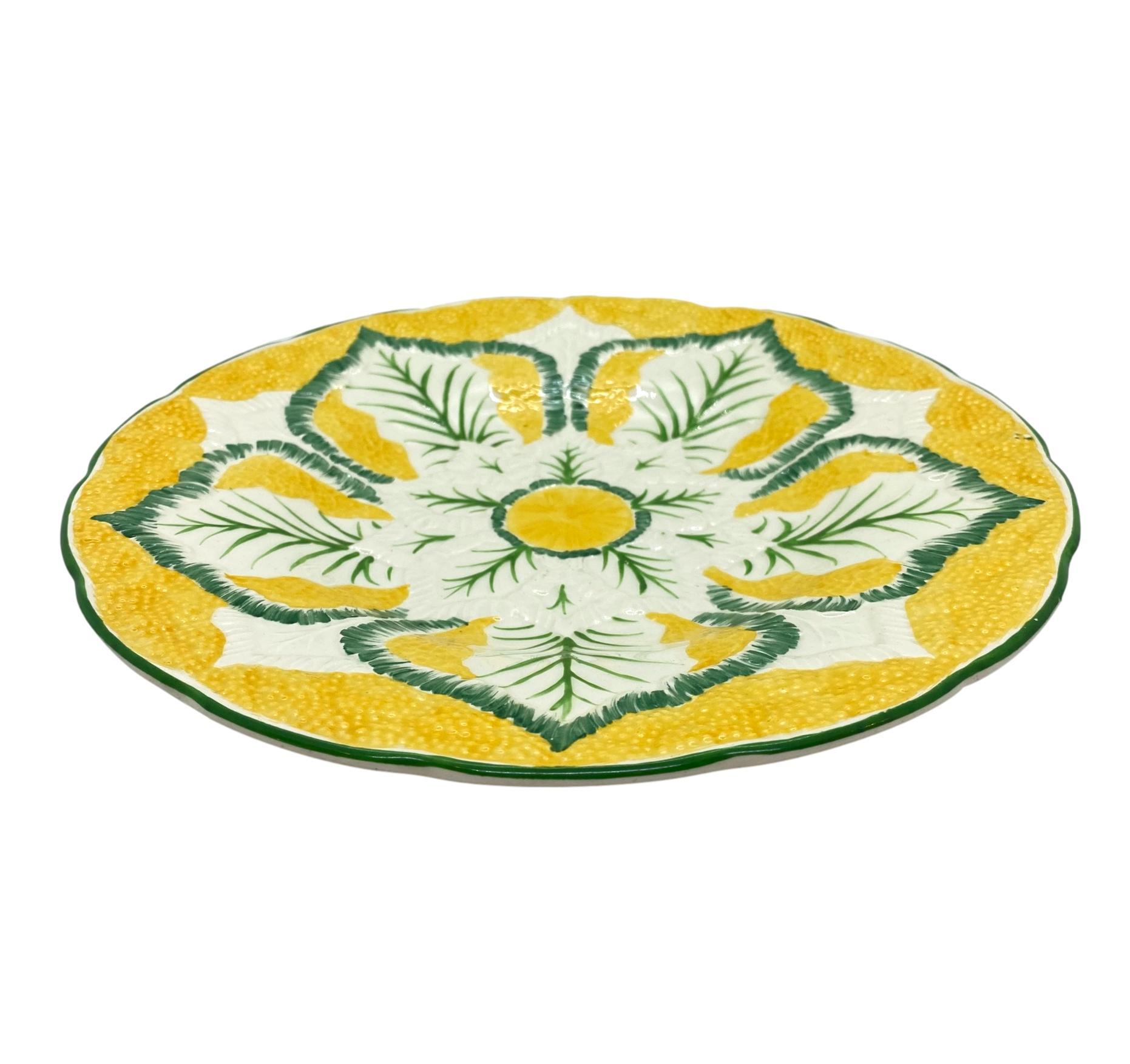 Wedgwood Majolica cauliflower pattern 9-in plate, molded as a stylized blooming cauliflower, on a vividly glazed yellow ground, the reverse with impressed marks: 'WEDGWOOD' and the firm's date code for November 1923,
English.
For nearly 30 years