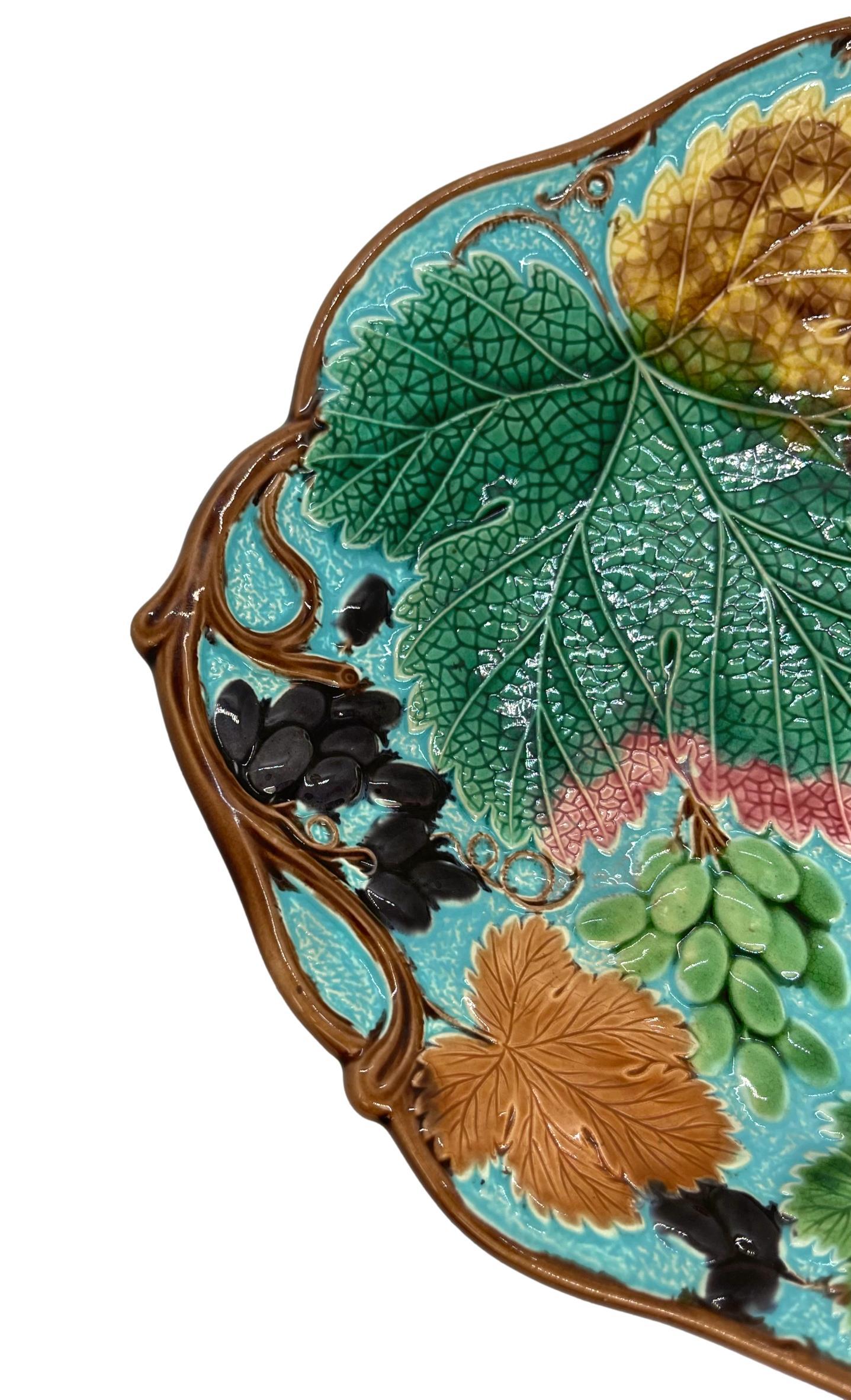 Wedgwood majolica bread tray, naturalistically molded with grapes, leaves, and vines on a turquoise blue ground, the reverse with impressed 'WEDGWOOD,' and Wedgwood date code 'F' for 1877.
For 30 years, we have been among the world's preeminent