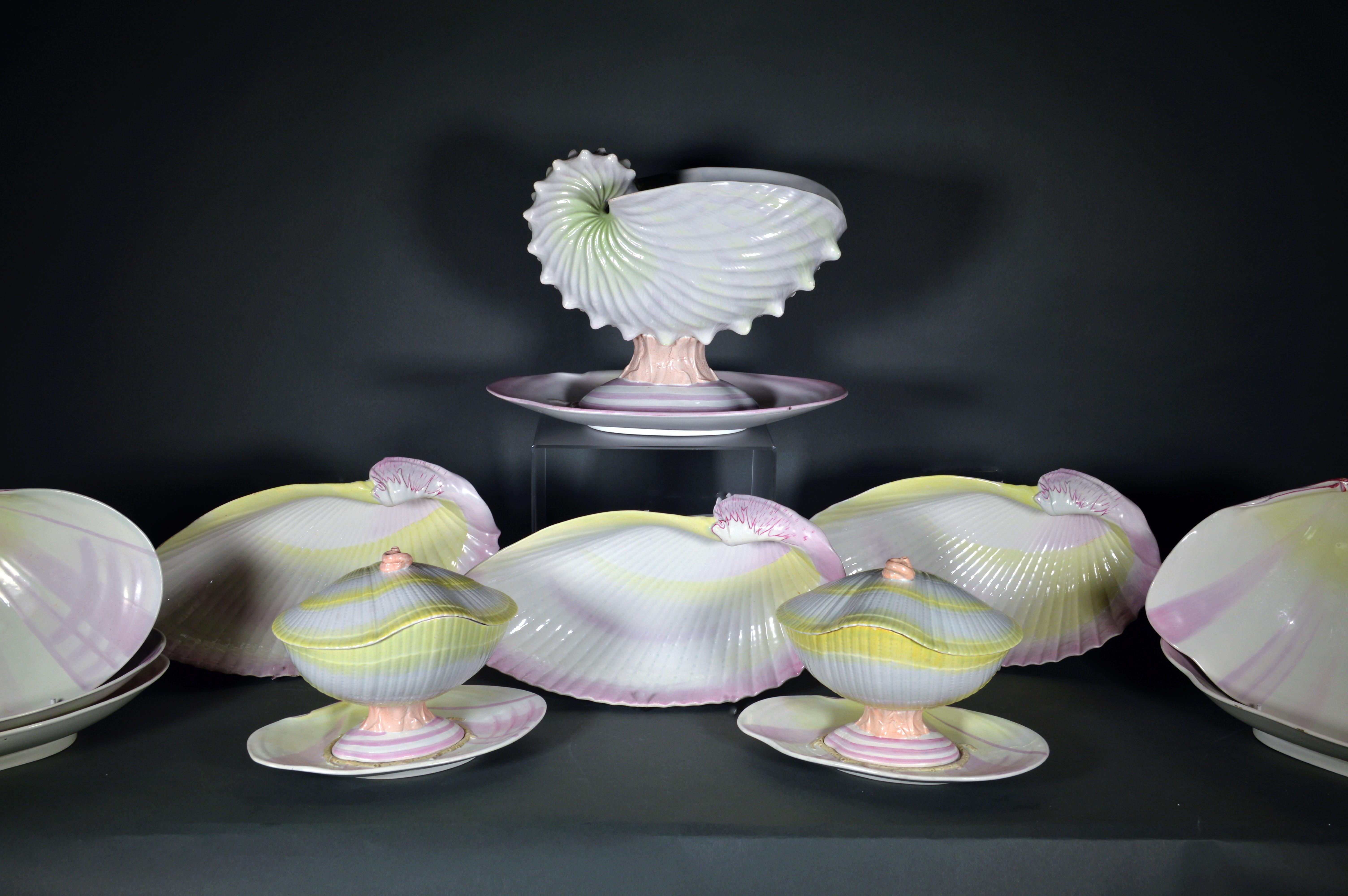 Wedgwood Nautilus yellow and pink pearlware shell service,
circa 1800-1810


The fine quality Wedgwood pearlware pottery service is known as the Nautilus design. Each piece naturalistically molded as various shells in shades of pink and unusually