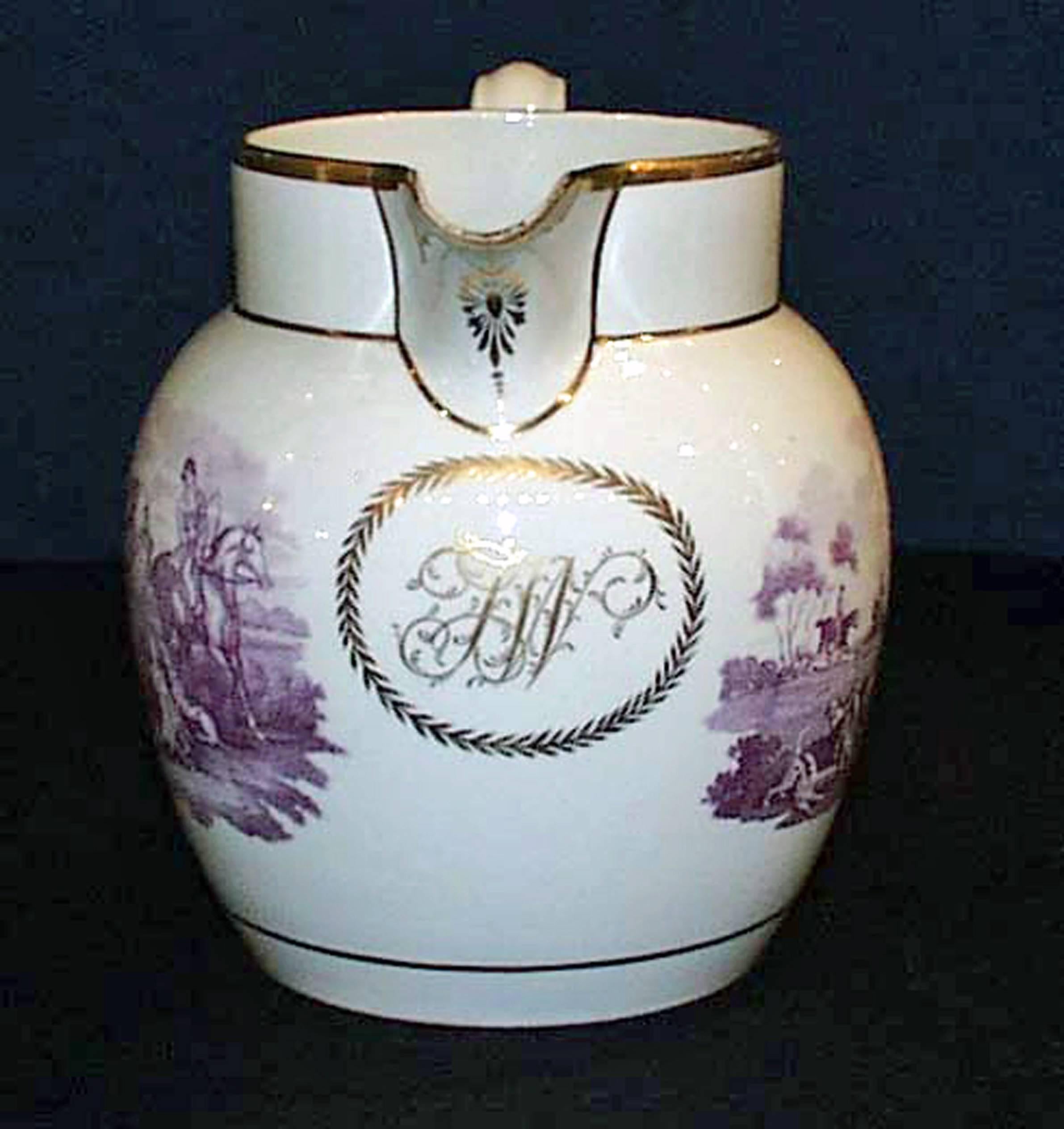 Wedgwood pearlware pottery fox hunting jug, 
circa 1810.

This ovoid jug has a cylindrical neck, a projecting lip, and a ribbed ear-shaped loop handle. Bat printed on each side in puce is a hunting scene. A thin gilt band encircles the bottom as