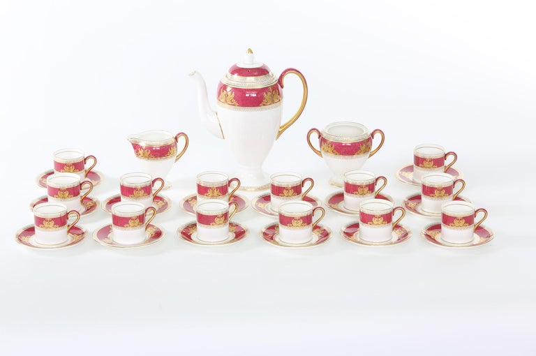 Wedgwood porcelain with gold design detail coffee service for fourteen people. Each piece is in great condition. Maker's mark undersigned. Service include 14 coffee / expresso cups 2.3