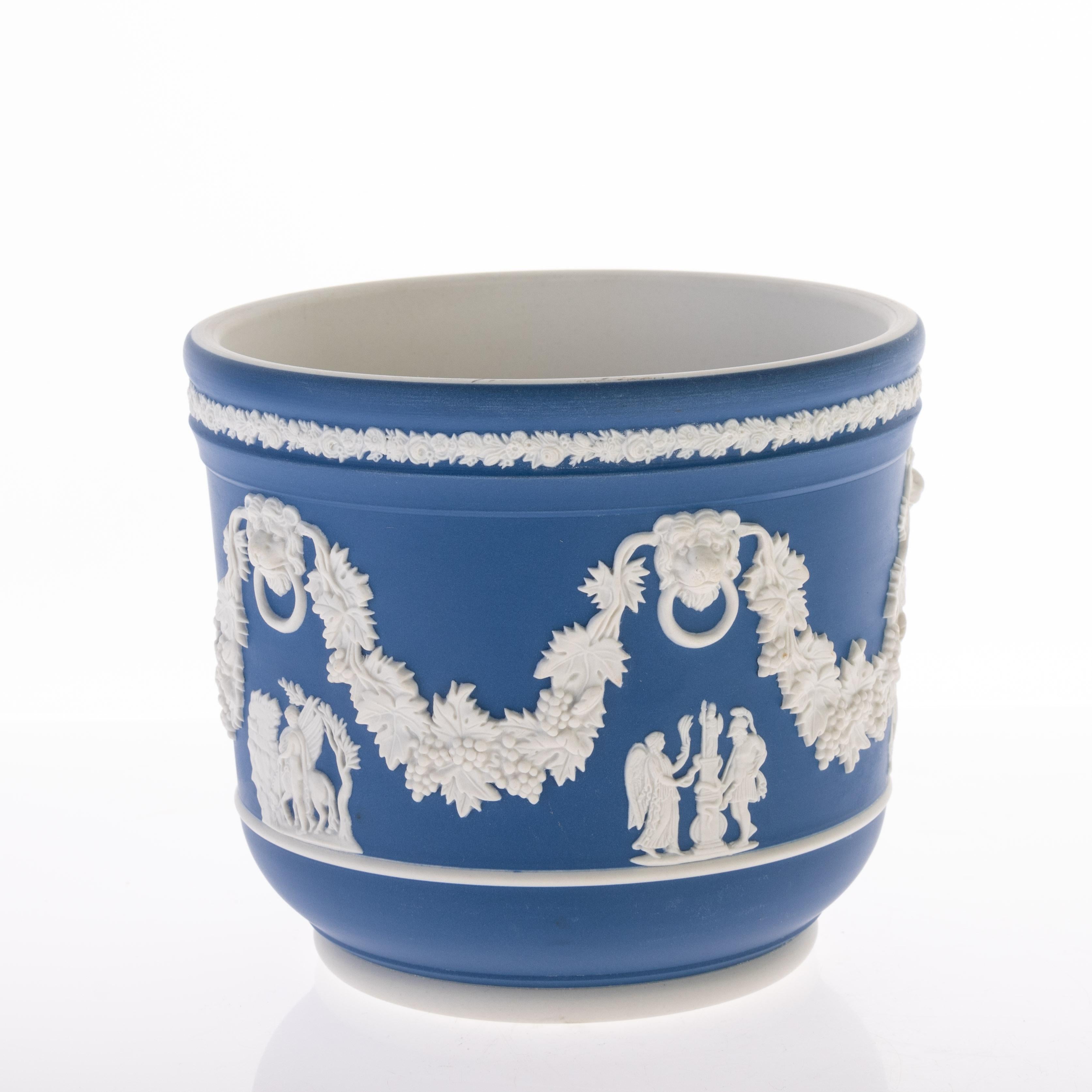 Wedgwood Portland Blue Neoclassical Jasper Jardiniere Cameo Planter Vase, with impressed marks to base.


From a private collection

Free international shipping.