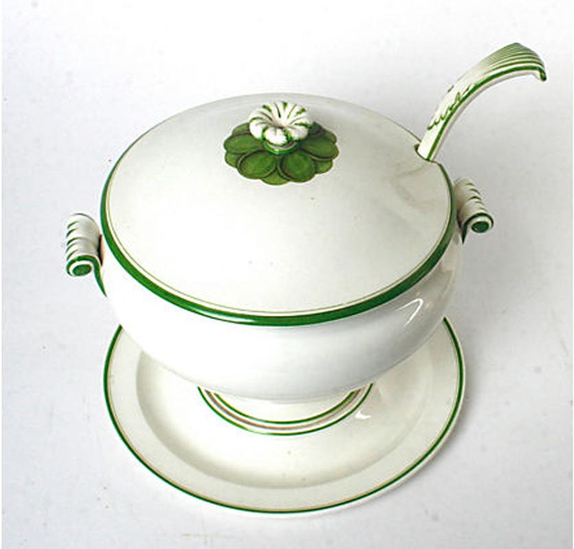 A green and cream colored Wedgwood Queen's ware soup tureen, underplate and laddle, with collection labels from 