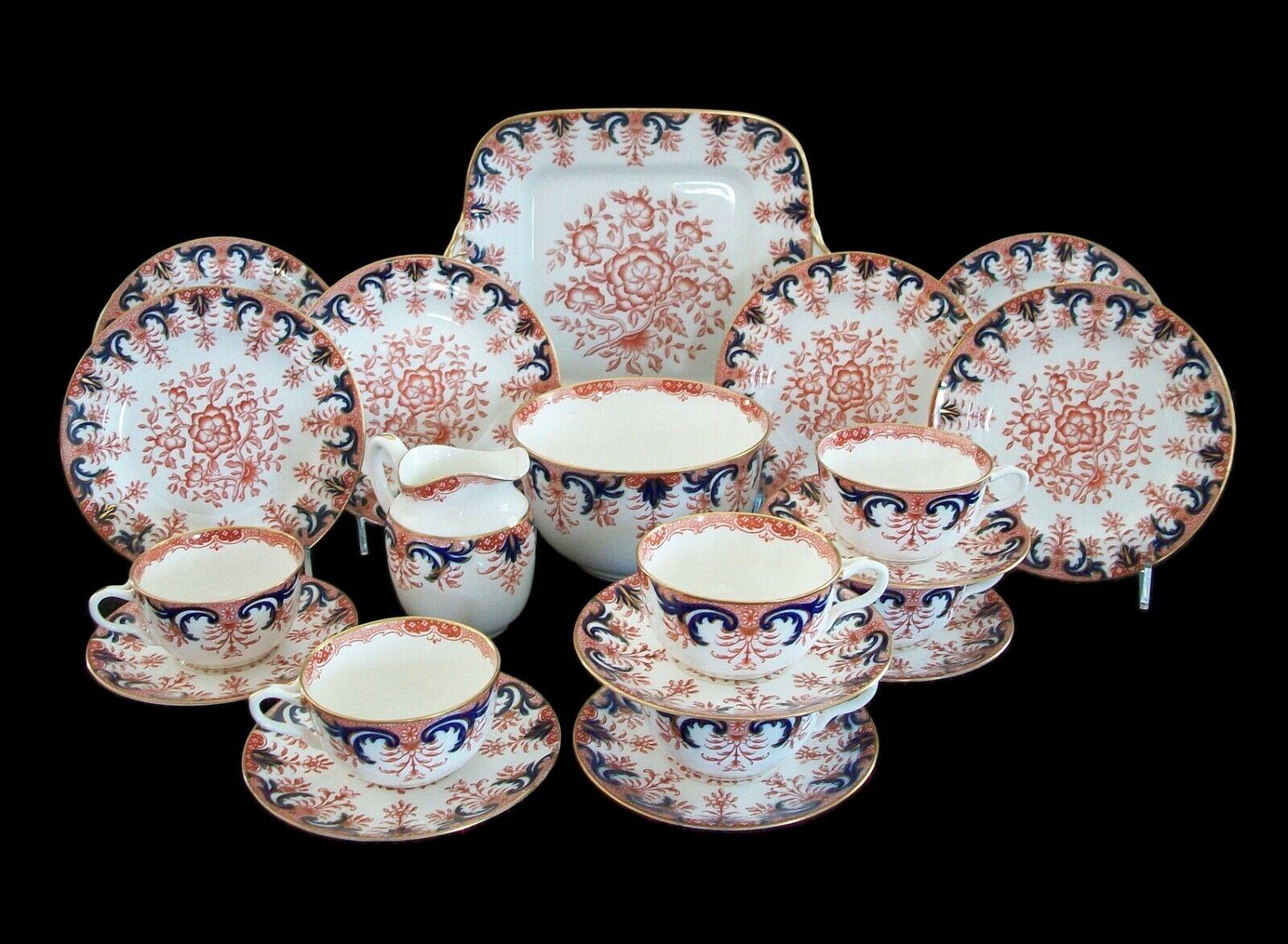 Wedgwood - exceptional and rare antique brick red transferware and flow blue luncheon set for six - hand painted gilded borders and details - consisting of a serving platter/tray, 6 tea cups and saucers, 6 luncheon plates, a creamer and slop bowl -