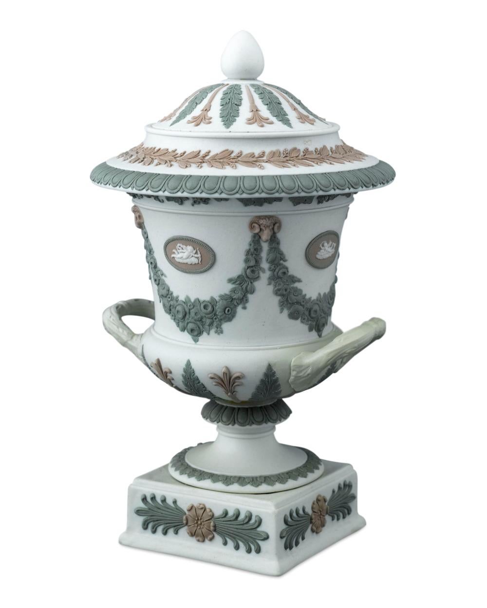 This exceptional and rare Wedgwood tri-colored jasper vase exemplifies that renowned firm’s classical artistry. Crafted of jasper, perhaps the greatest of Josiah Wedgwood’s porcelain innovations, in the shape of an ancient Greek calyx krater vase,