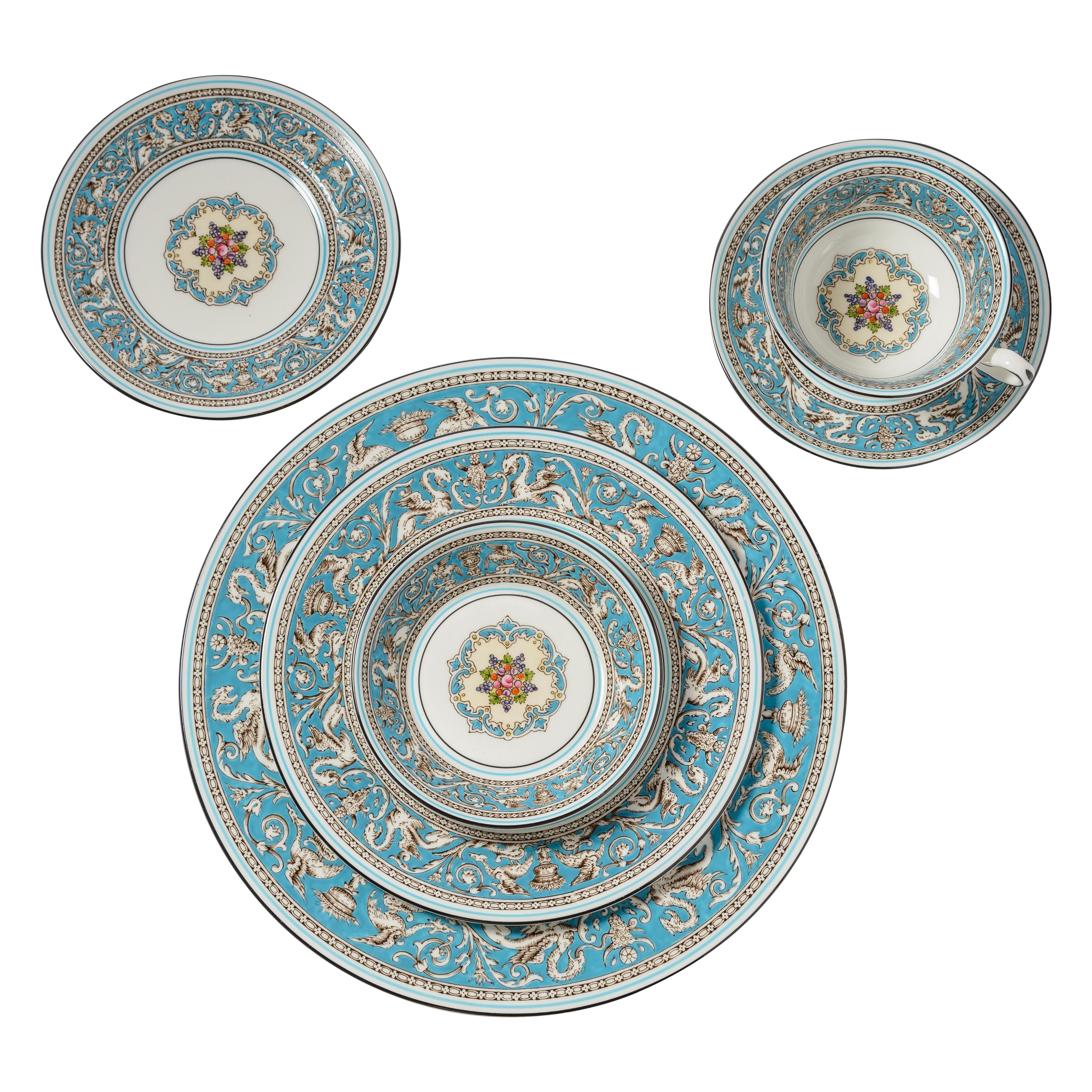 A classic pattern by Wedgwood England: Florentine. This vibrant hand enameled pattern features a lovely medallion center and finely detailed design on crisp white porcelain. The set is in wonderful vintage condition and has:
12 Dinner Plates
12