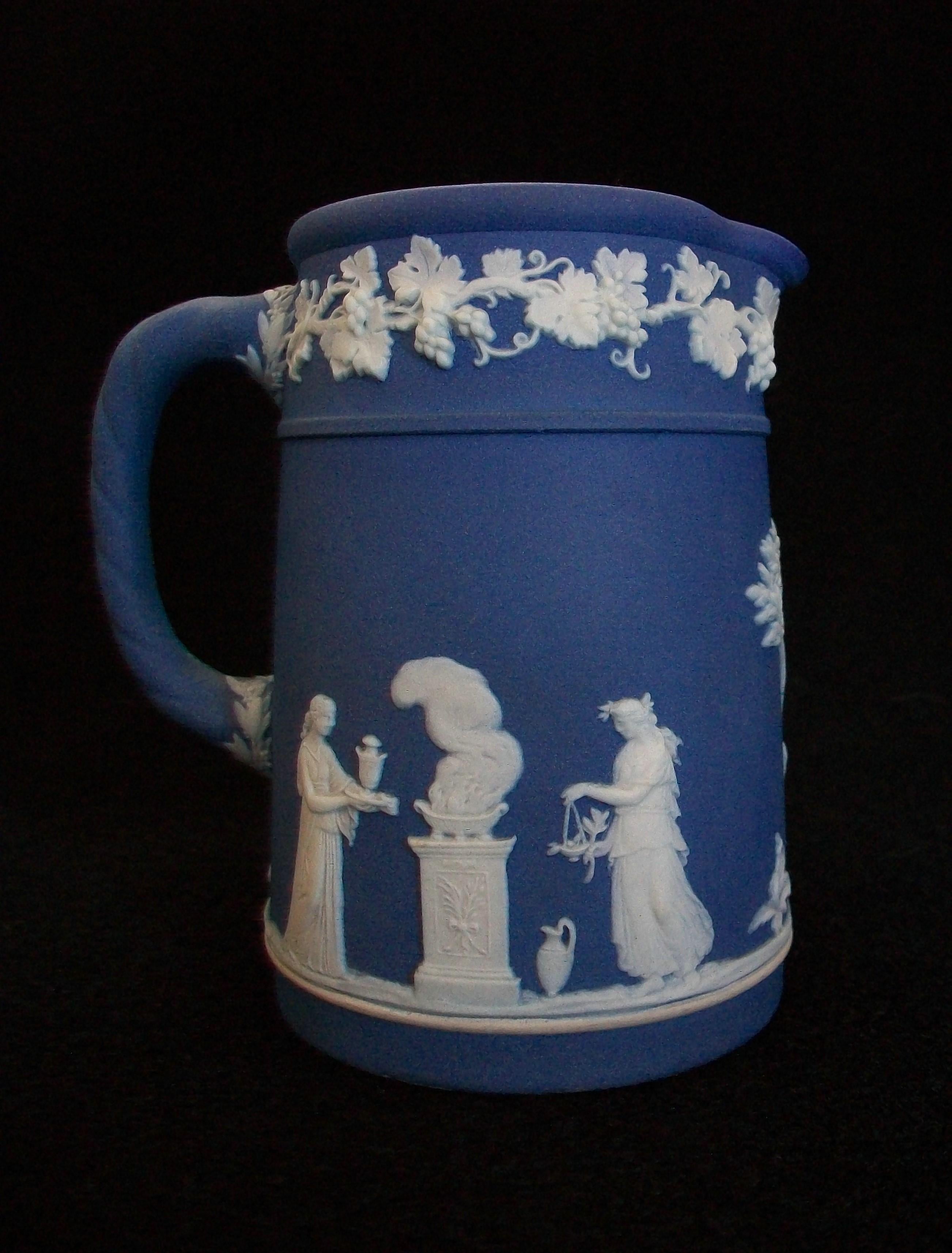 WEDGWOOD - Vintage blue and white Jasperware ceramic pitcher or creamer - signed / stamped on the base - United Kingdom - circa 1950's.

Excellent / mint vintage condition - no loss - no damage - no restoration - minimal signs of age and