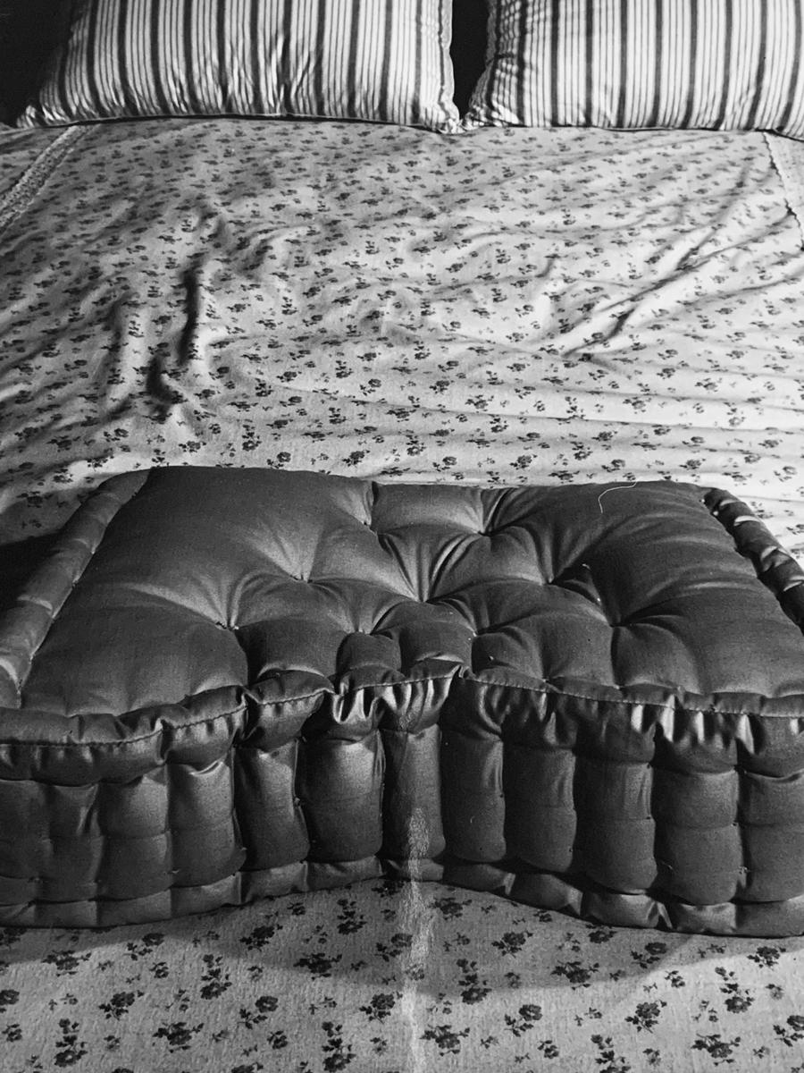 Bundling Bed and pillows, c.1950-60, by Weegee, gelatin silver print, stamped  1