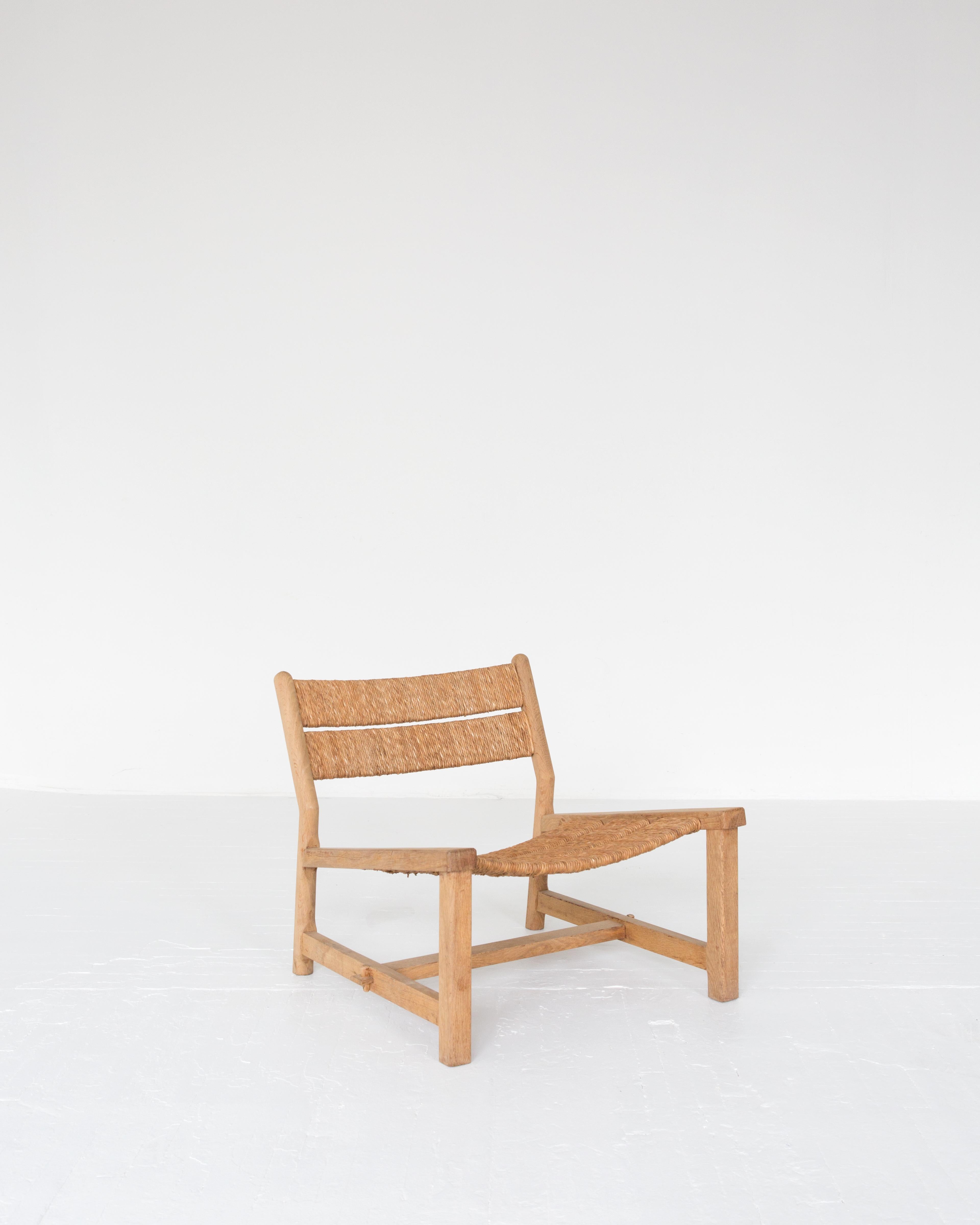 A rare first edition of the rush weekend chair by Pierre Gautier-Delaye as displayed at the 