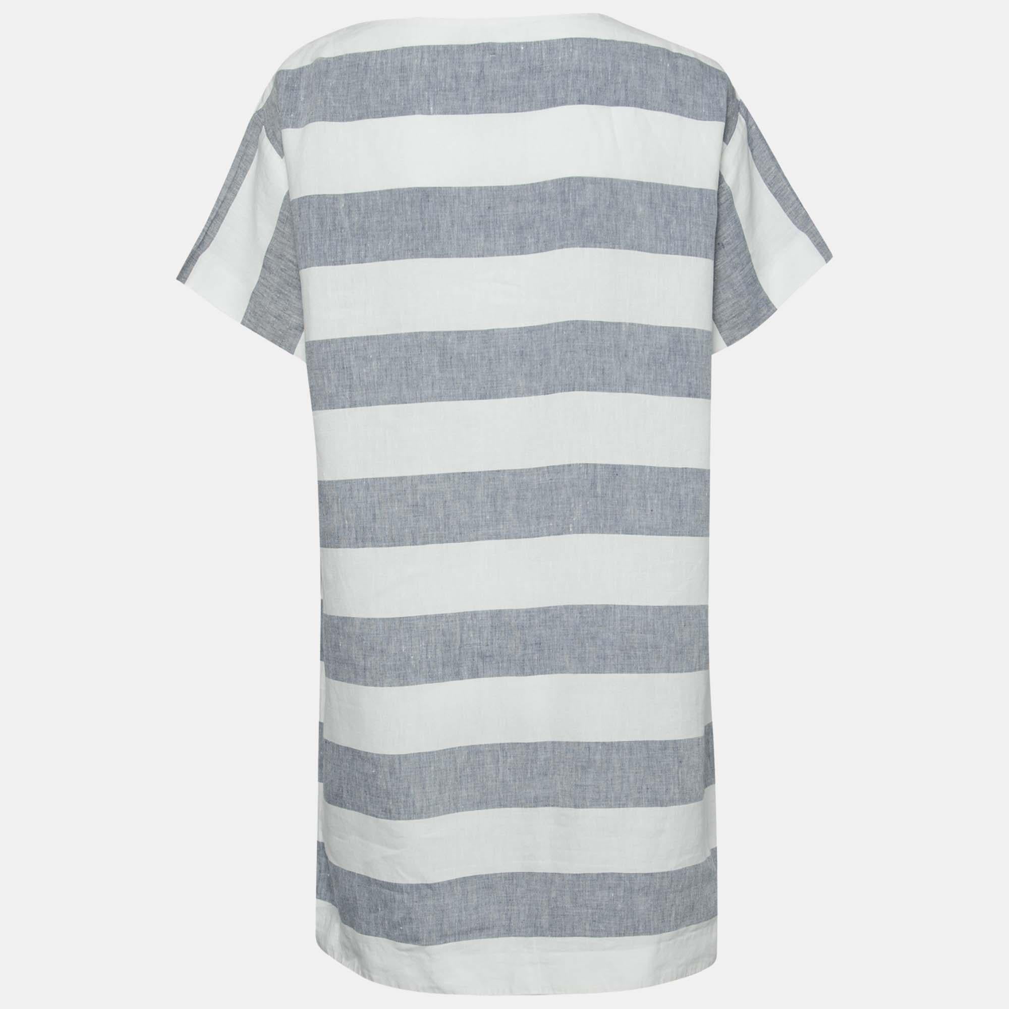 Simple comfortable and elegant this dress from Weekend Max Mara is a great pick for casual use in the summer. It is fashioned in blue white linen fabric which is enhanced with stripes. It accommodates two pockets. Pair it with your favorite flats