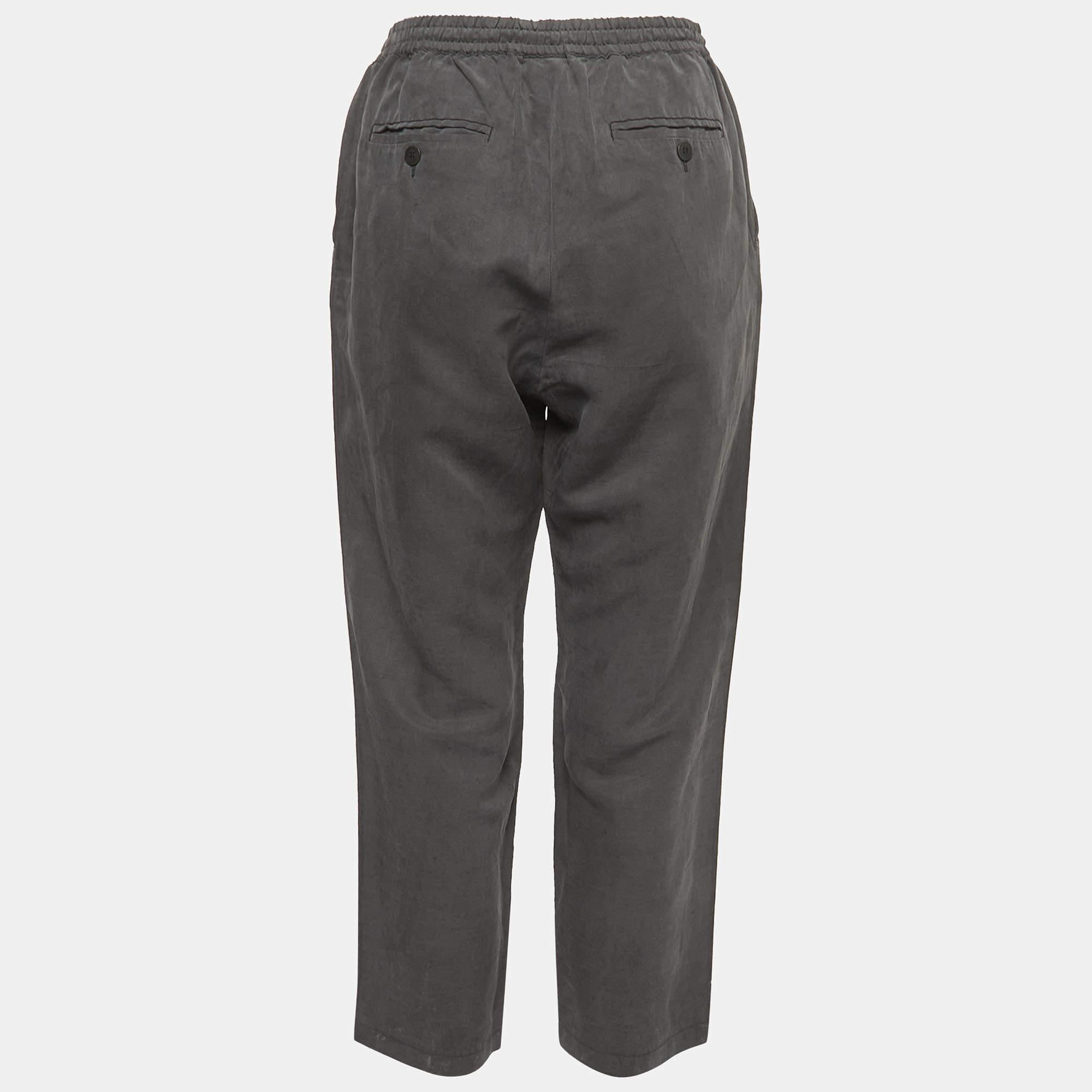 Ce pantalon est à la fois élégant et chic. Fabriqué à partir de tissus de qualité et doté d'une coupe parfaite, ce pantalon s'accompagne d'un haut chic.