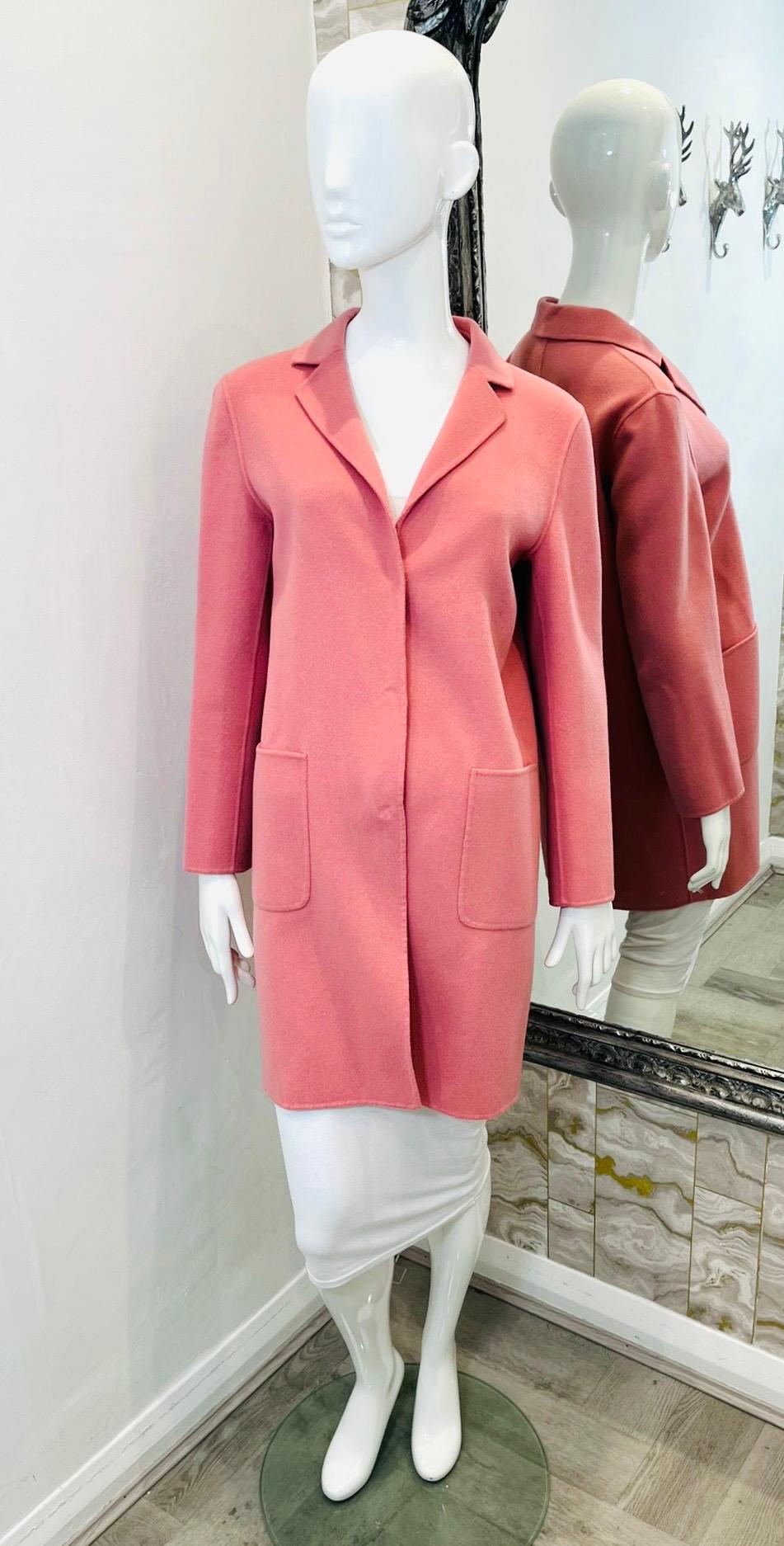 Weekend Max Mara Virgin Wool Coat

Pink, mid-thigh length coat designed with hidden snap button plaque.

Featuring notched labels, patch pockets to the sides and vent to rear.

Size – 38FR

Condition – Very Good

Composition – 90% Virgin Wool, 10%