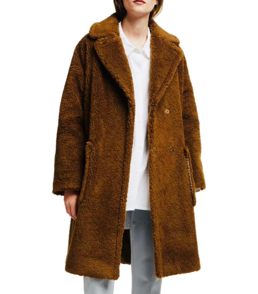 Weekend Max Mara Wool Blend Teddy Coat

Brown coat designed with faux fur effect.

Detailed with oversized collar, dropped shoulders and patch pockets.

Featuring loose fit and concealed snap button fastening.

Size – 36FR

Condition – Very