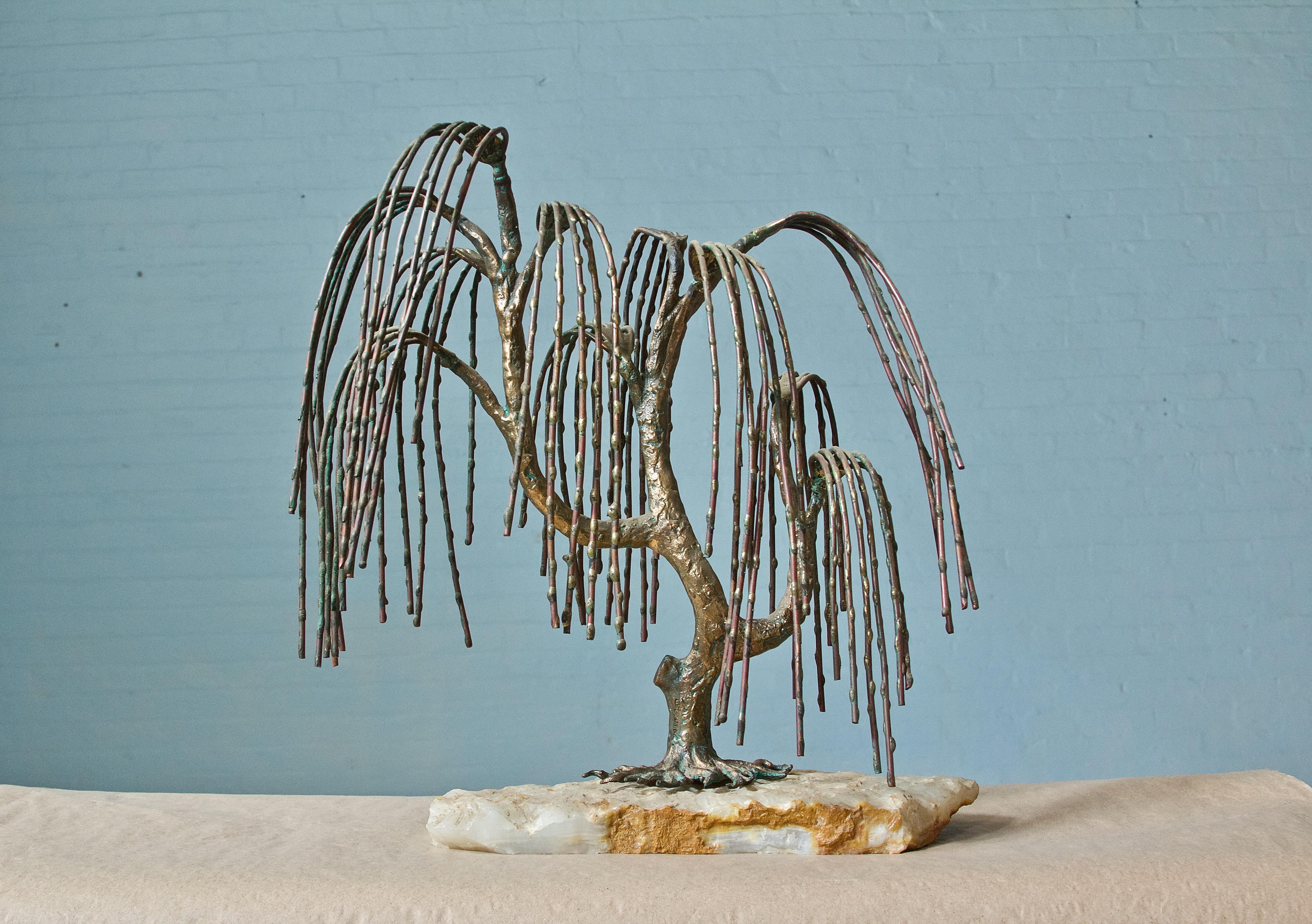Very attractive weeping willow tree sculpture by Brian Bijan. Tree is made with mixed copper and brass metal supported by a quartz stone base. Stamped 110-250 on trunk.