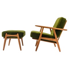 Wegner GE240 Cigar Lounge Chair and ottoman in Oak and HBF Martini Green Velvet