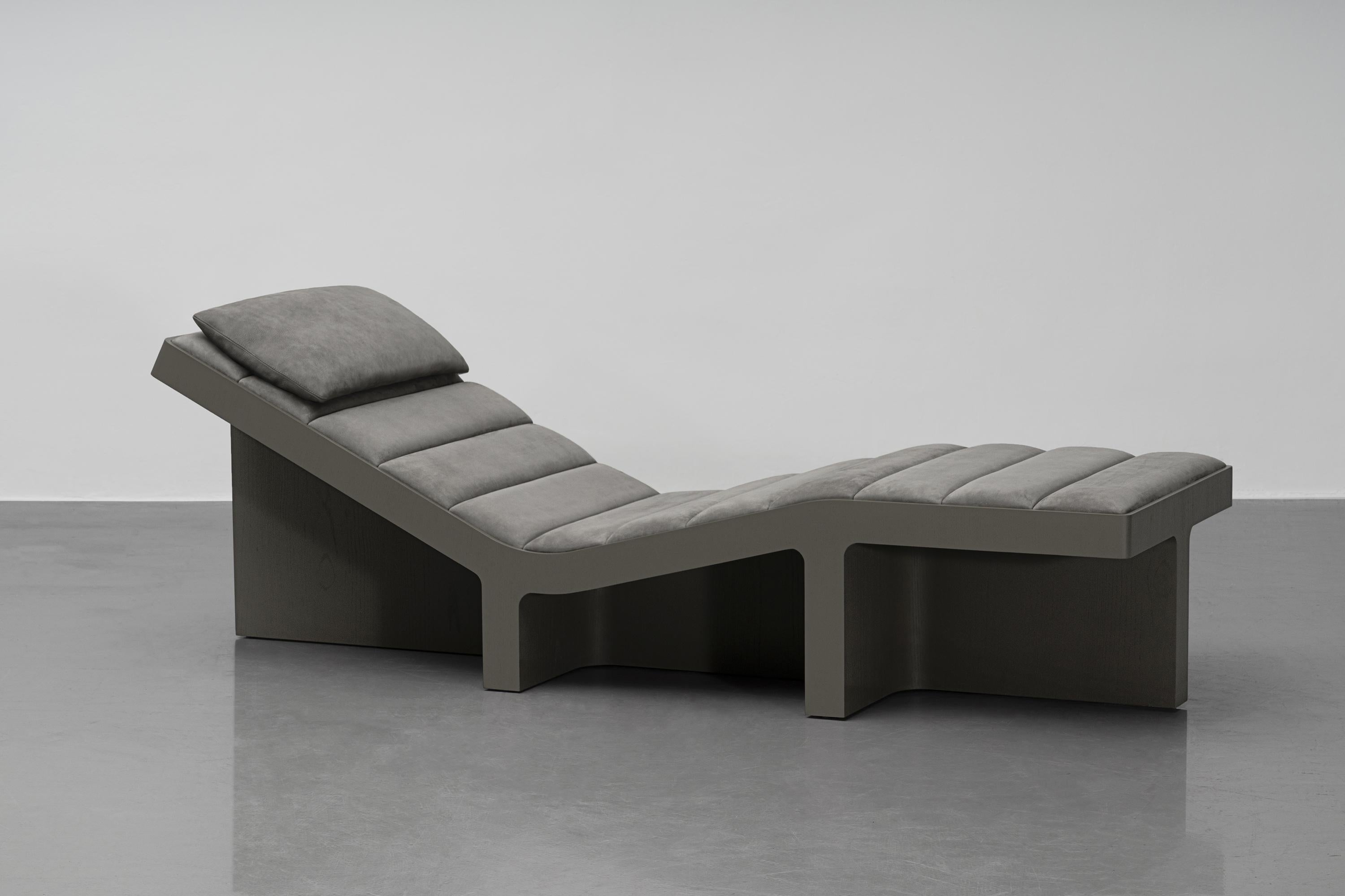 Weight of Shadow Chaise Longue by Atelier V&F
Dimensions: D 70 x W 206 x H 67 cm. Seat Height: 46.5 cm.
Materials: Ash and Nubuck.

Available in black or grey. Please contact us.

The weightiness and the fine curves of the blocks which are