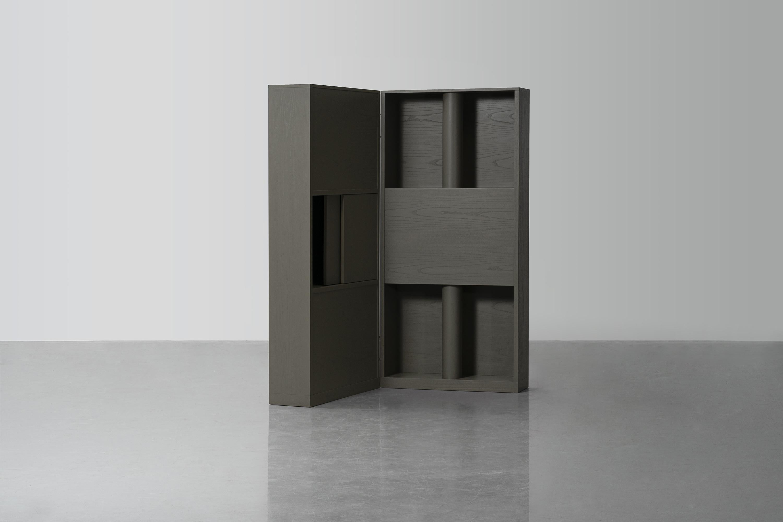 Weight of Shadow Screen Cabinet by Atelier V&F
Dimensions: Opened: D 25 x W 160 x H 168.5 cm. 
Closed: D 50 x W 80 x H 168.5 cm. 
Materials: Ash.

Available in black or grey. Please contact us.

The weightiness and the fine curves of the blocks