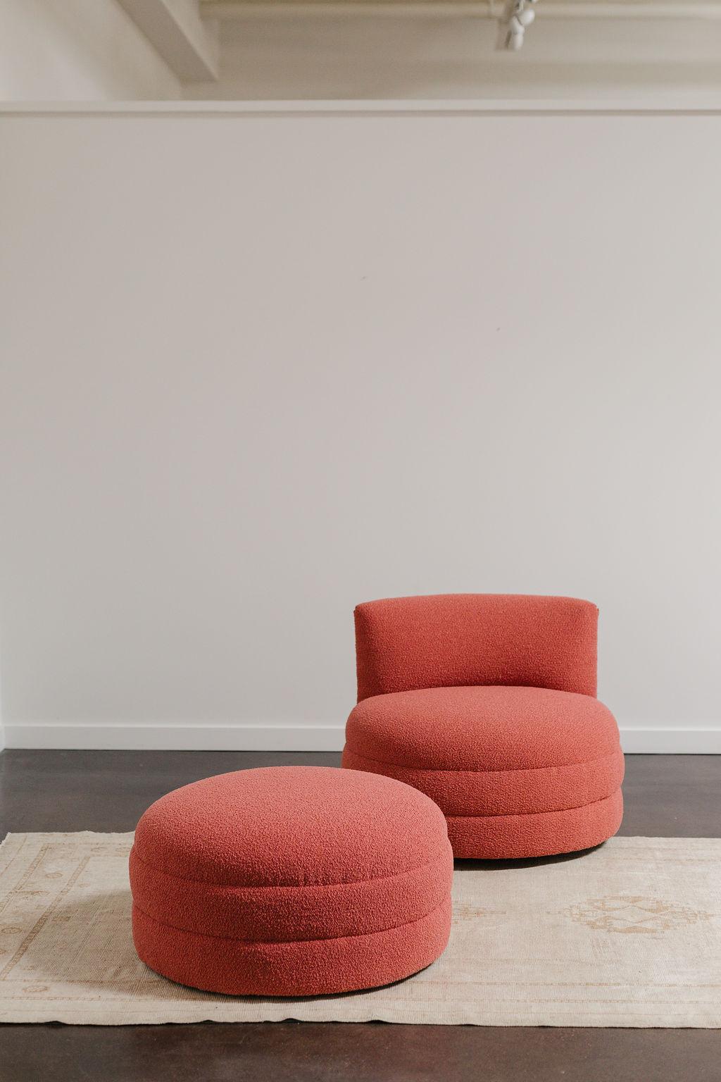 A stylish Vladimir Kagan-inspired Weiman barrel lounge swivel chair and ottoman from the 1980s, refinished by the Selby House in a resilient Yarn Collective boucle upholstery, enhancing its chic and refined appearance.