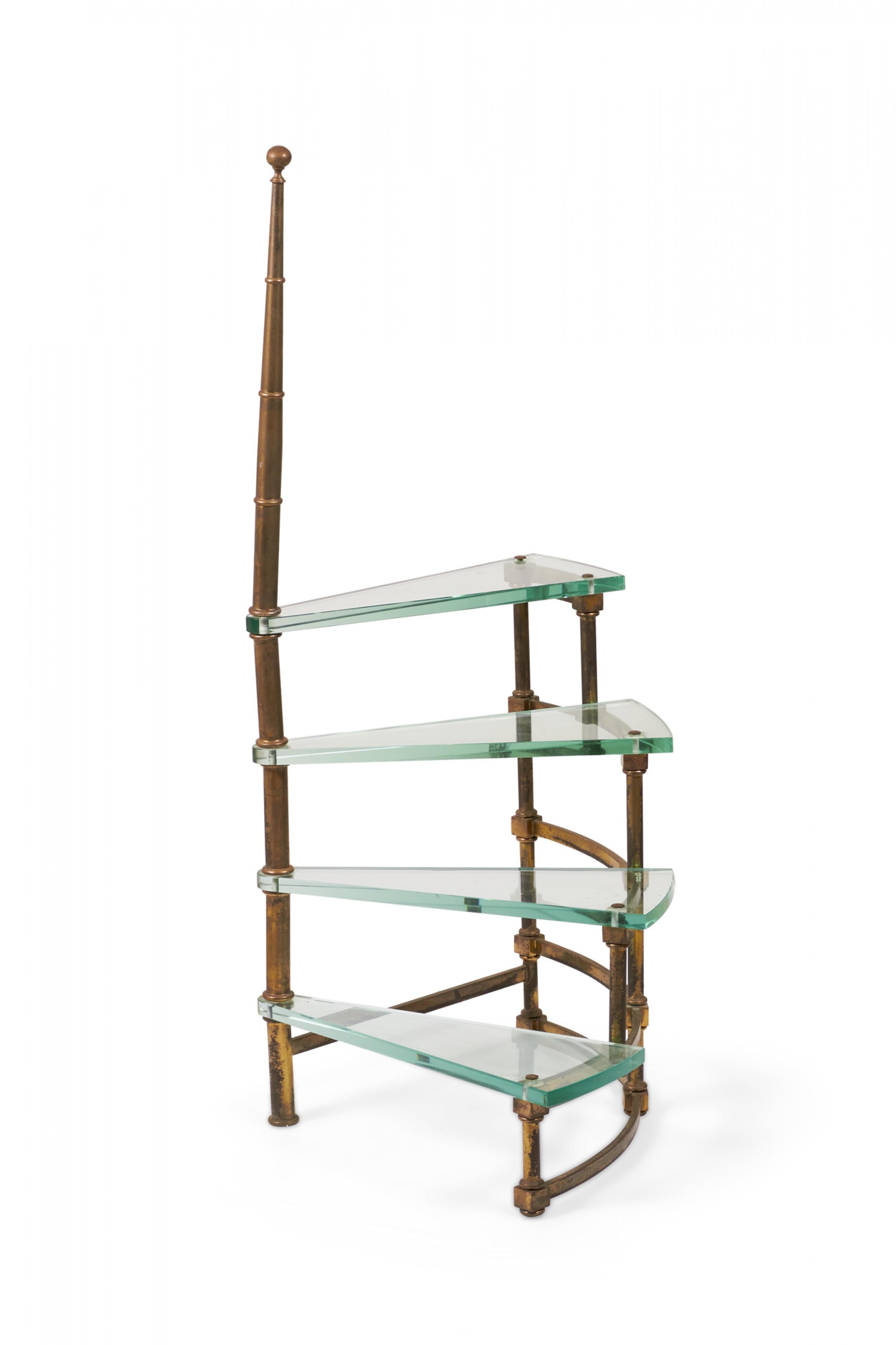 Italian Mid-Century High Style (circa 1960) library steps display stand with a brass frame having a natural patina and four ascending glass steps and a removable upper brass finial. (WEIMAN)
