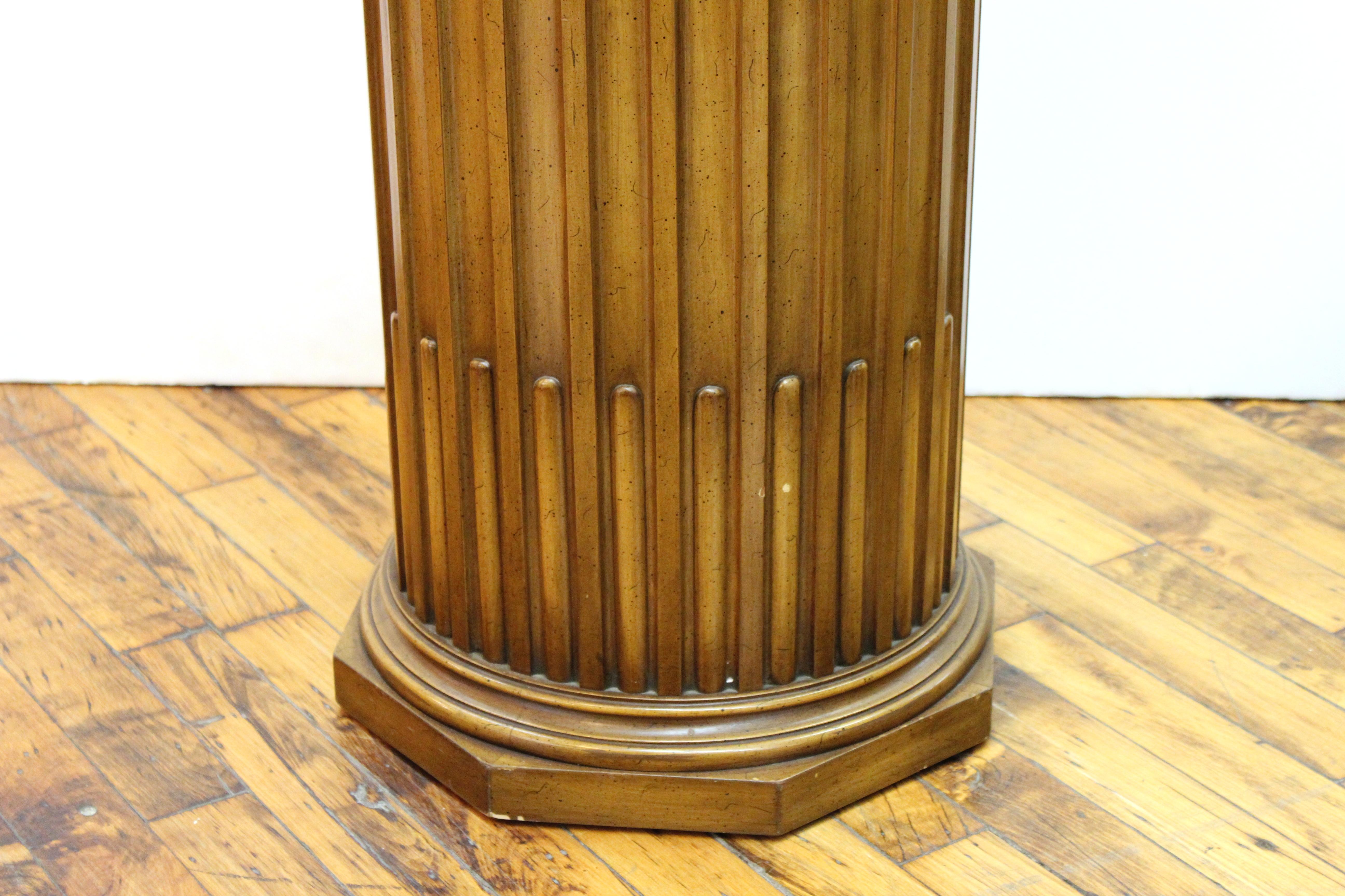 carved wood pedestal