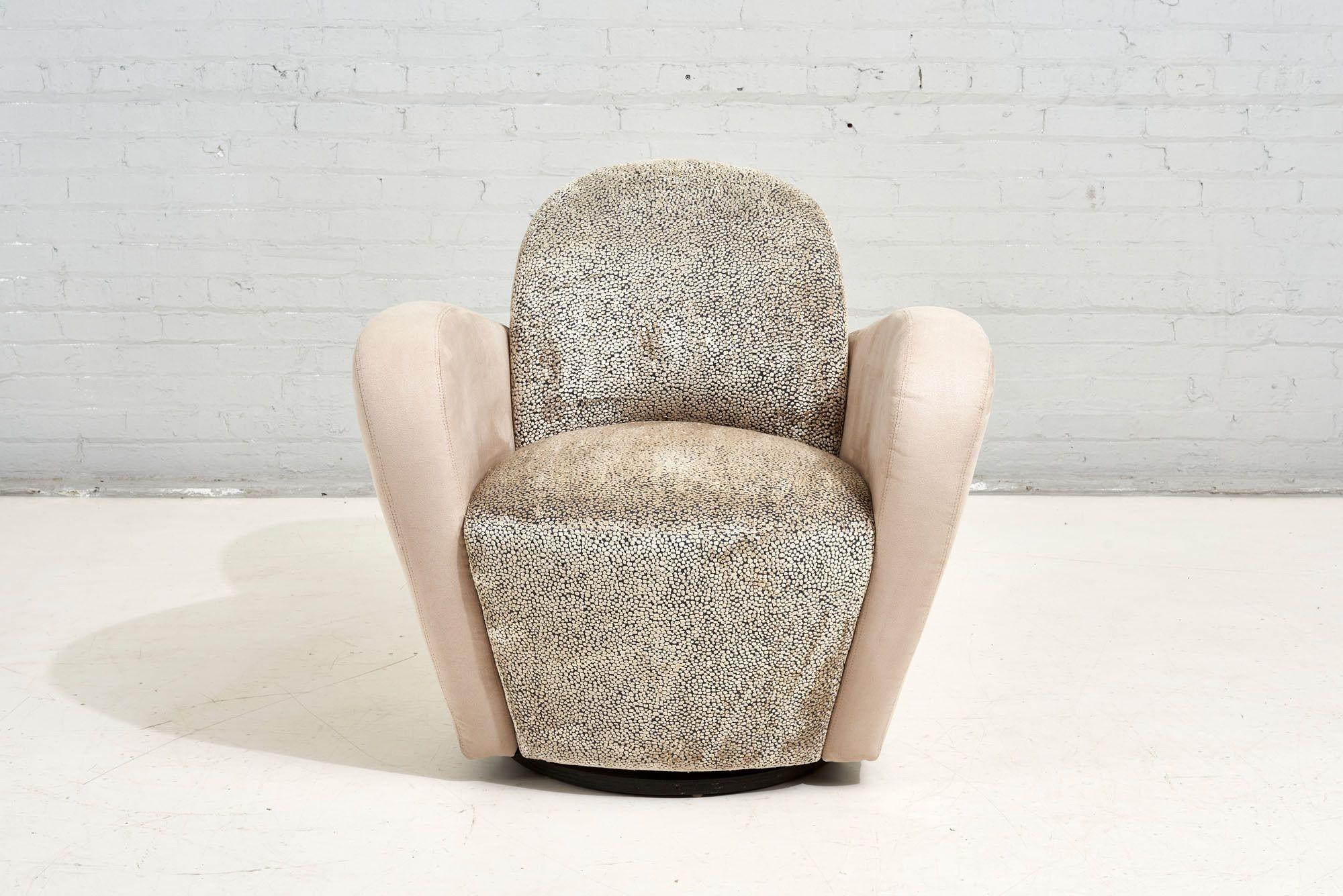 Weiman Postmodern Swivel lounge chair, 1980. Original upholstery and black plinth swivel base.