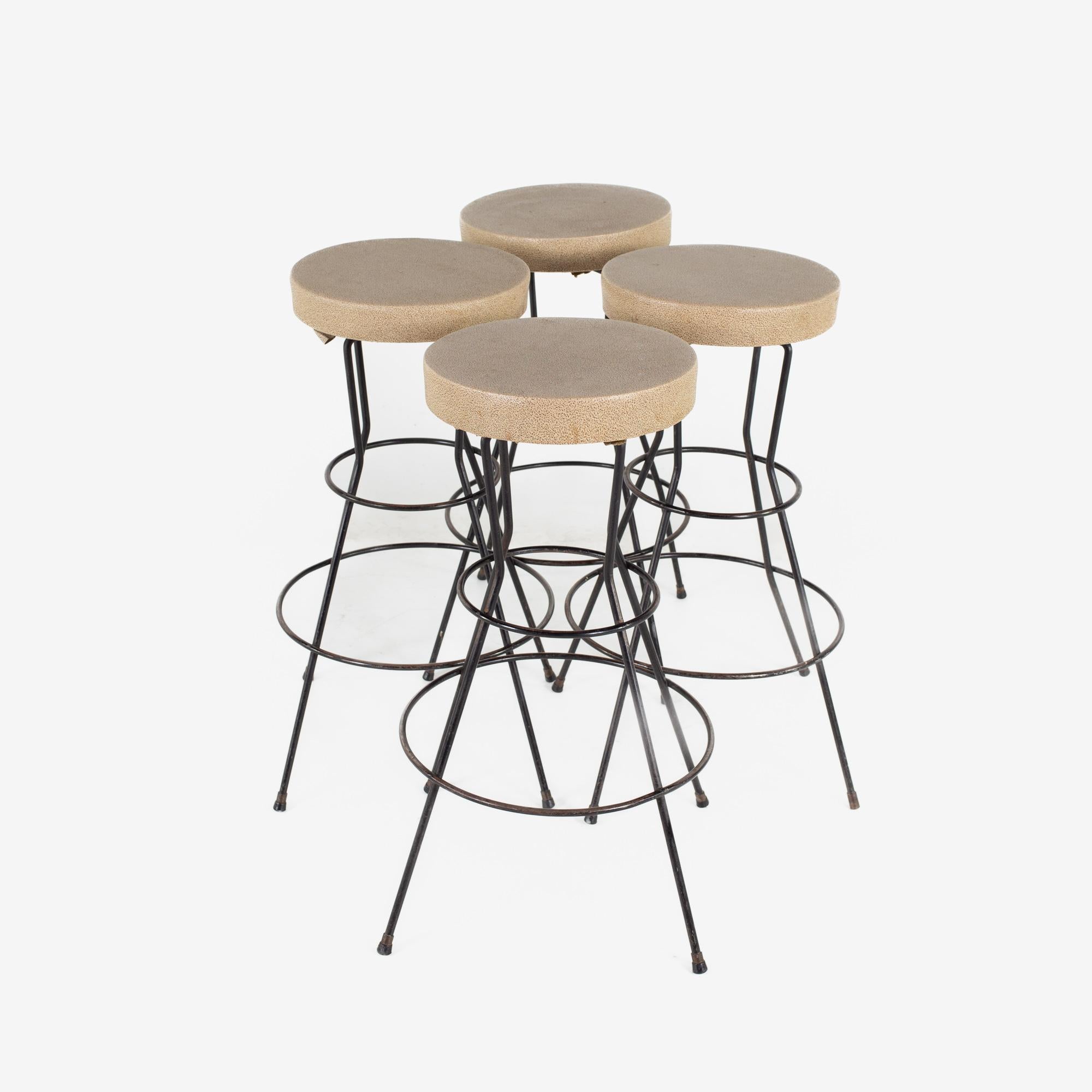 Weinberg style mid century brown vinyl and iron stools - Set of 4

Each stool measures: 21 wide x 21 deep x 28.5 inches high

All pieces of furniture can be had in what we call restored vintage condition. That means the piece is restored upon