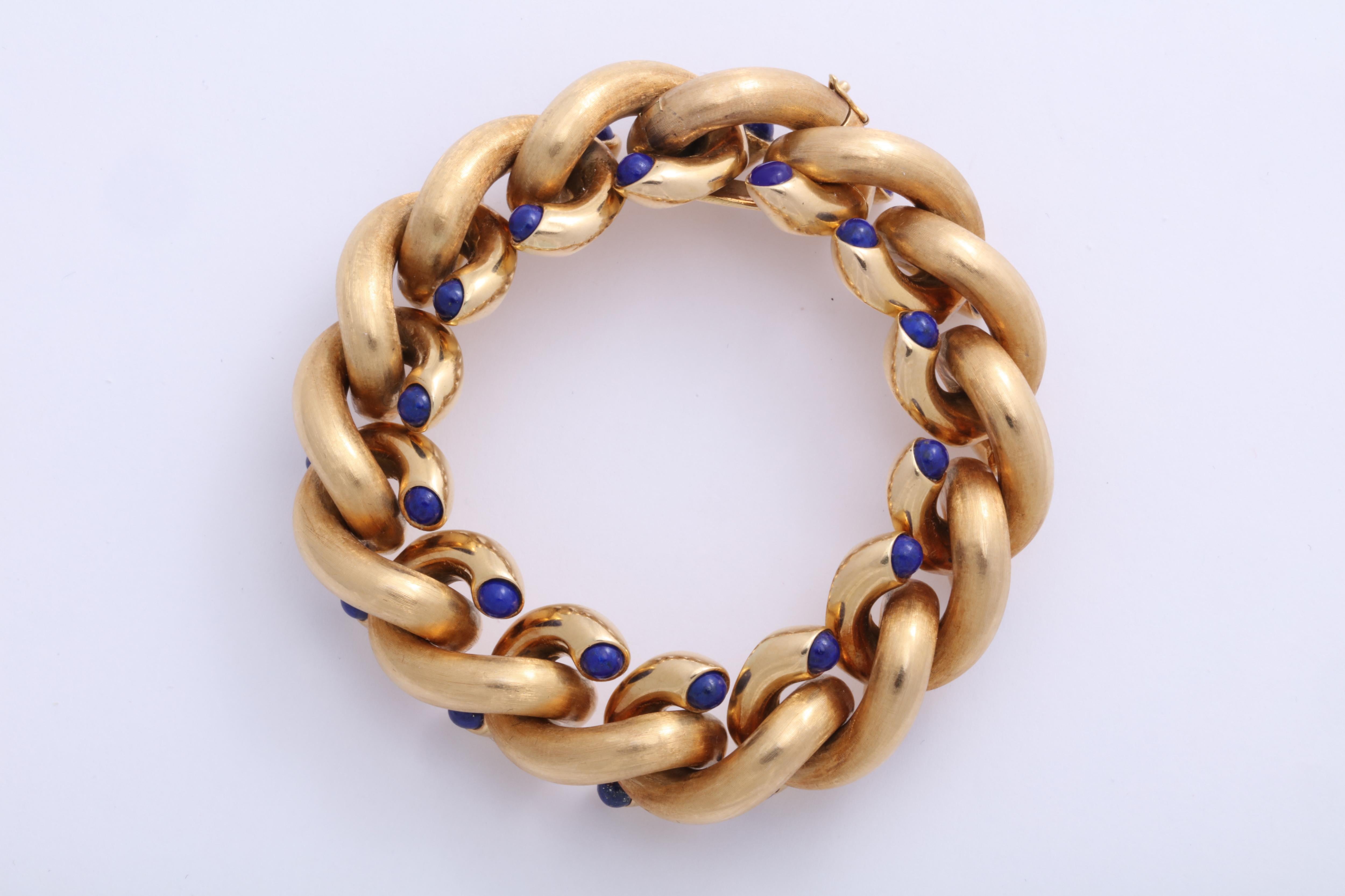 18kt Yellow Gold Cable Link Bacelet.  Each link having a cabochon Lapis Lazuli - bezel set.  Post 1935- Signes Weingrill.  Very elegant and very chic
