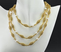 Perla Weingrill  Collar de cadena larga en espiral de cordón 18 KT