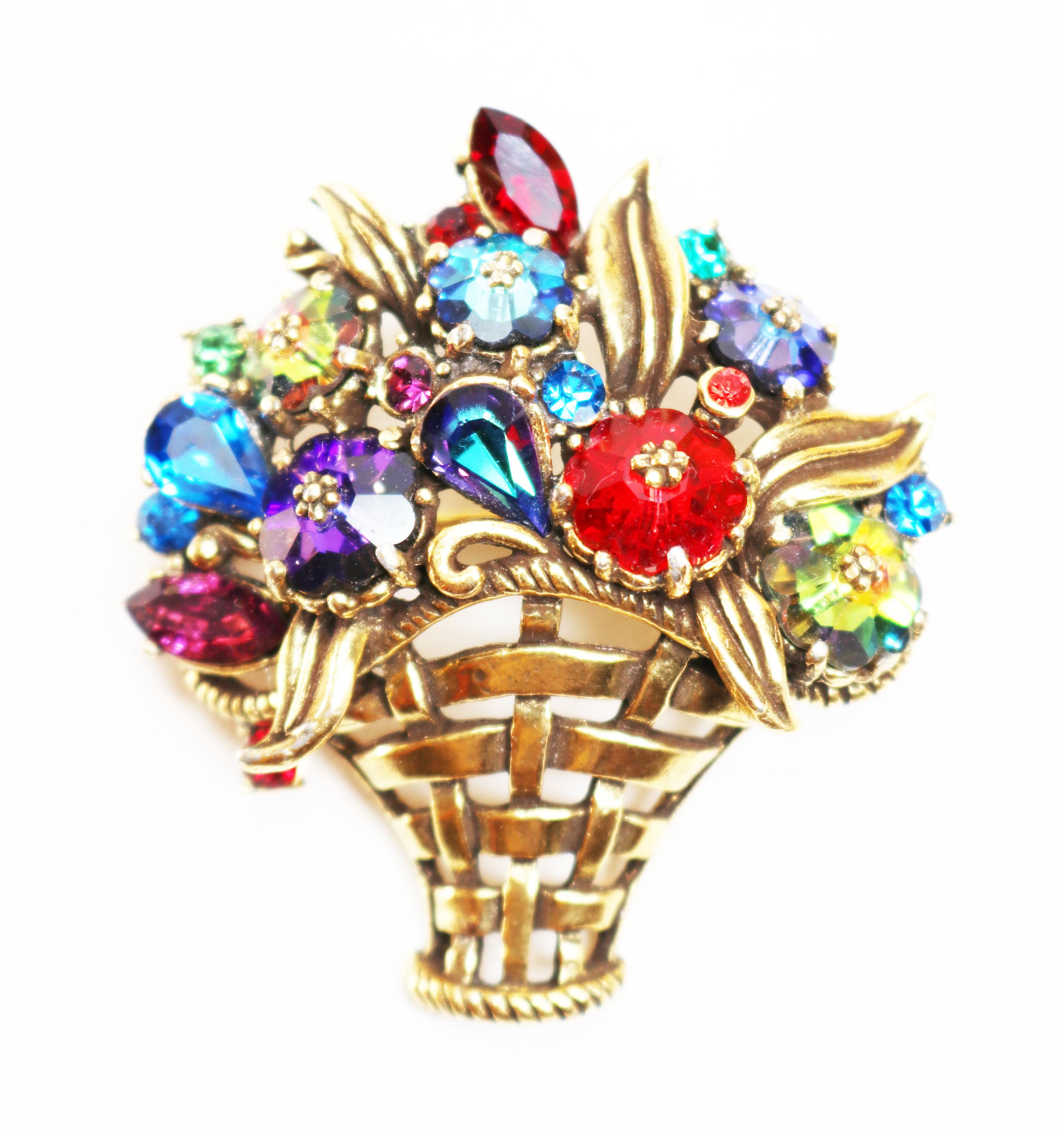 This 1950s WEISS *signed* Jeweled Basket Brooch really dazzles with a spectacular floral bouquet of brightly colored crystals dancing in the light, sparkling and shining. There are gorgeous crystals in deep ruby red, aurora borealis treated green