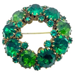 WEISS signed vintage gold tone green rhinestones designer brooch