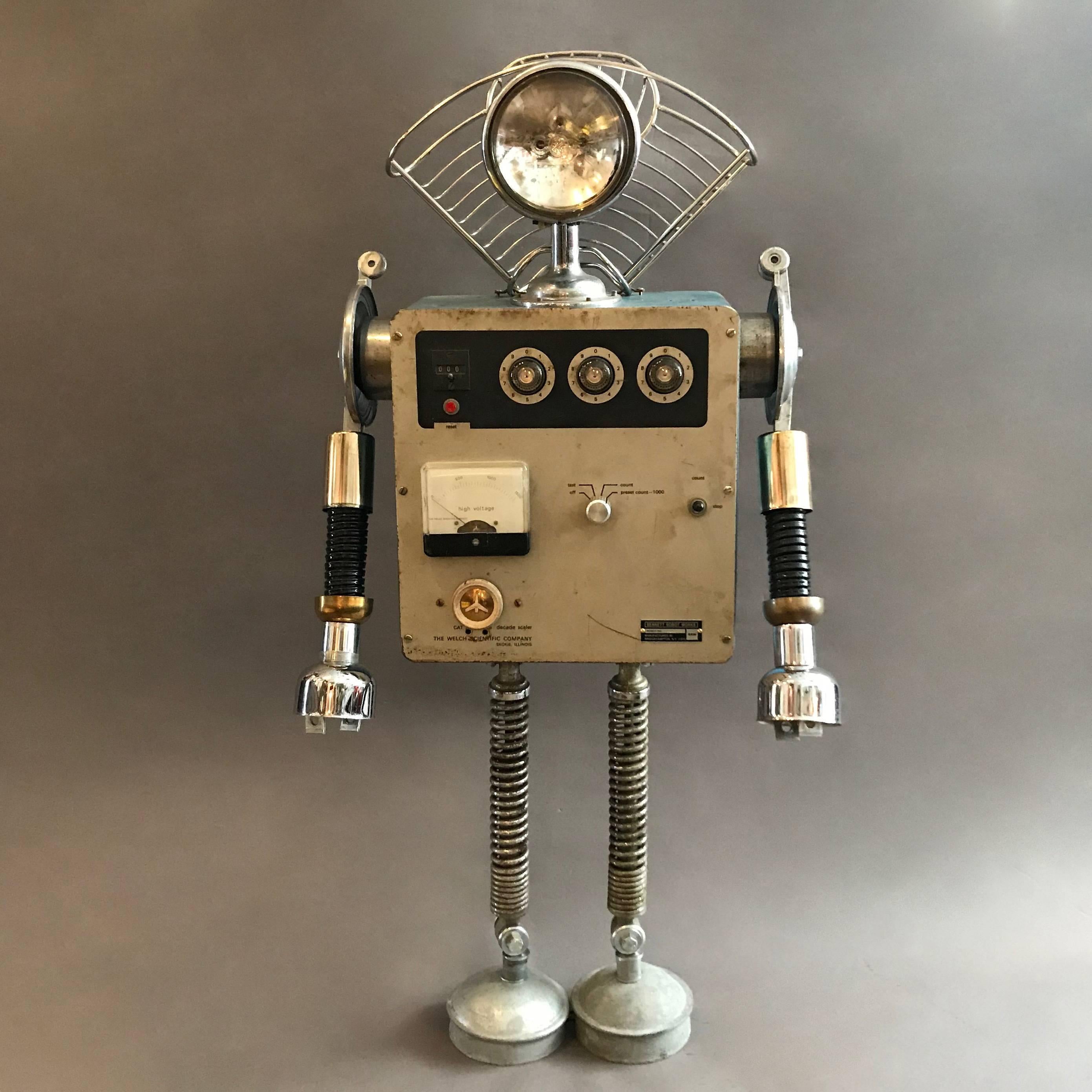 Custom robot sculpture named Welch by Bennett Robot Works, Brooklyn, NY

Bennett Robot Works, robot sculptures created by Gordon Bennett, are composed of found objects used in their unaltered entirety. They are inspired by Norman Bel Geddes and