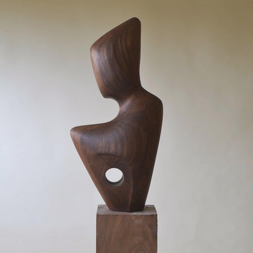 Welcome Sculpture by Chandler McLellan
Limited Edition of 8 Pieces.
Dimensions: D 17. 8 x W 25.4 x H 57.2 cm. 
Materials: Walnut.

Sculptures will be signed and numbered on the bottom of the base. Wood grain will vary, wood species will not. Please