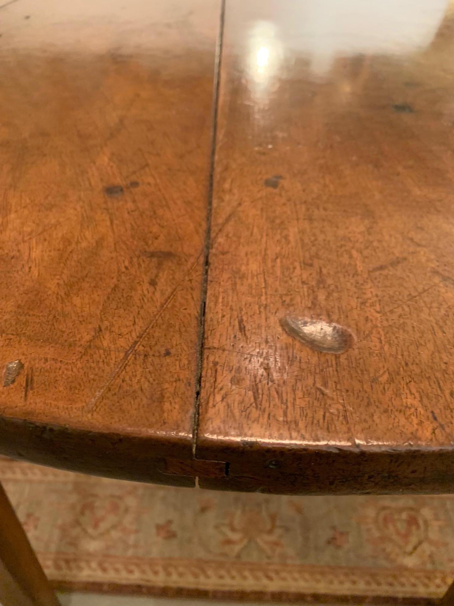 Welcoming Much Loved Antique Oval Tavern Dining Table In Good Condition For Sale In Hopewell, NJ