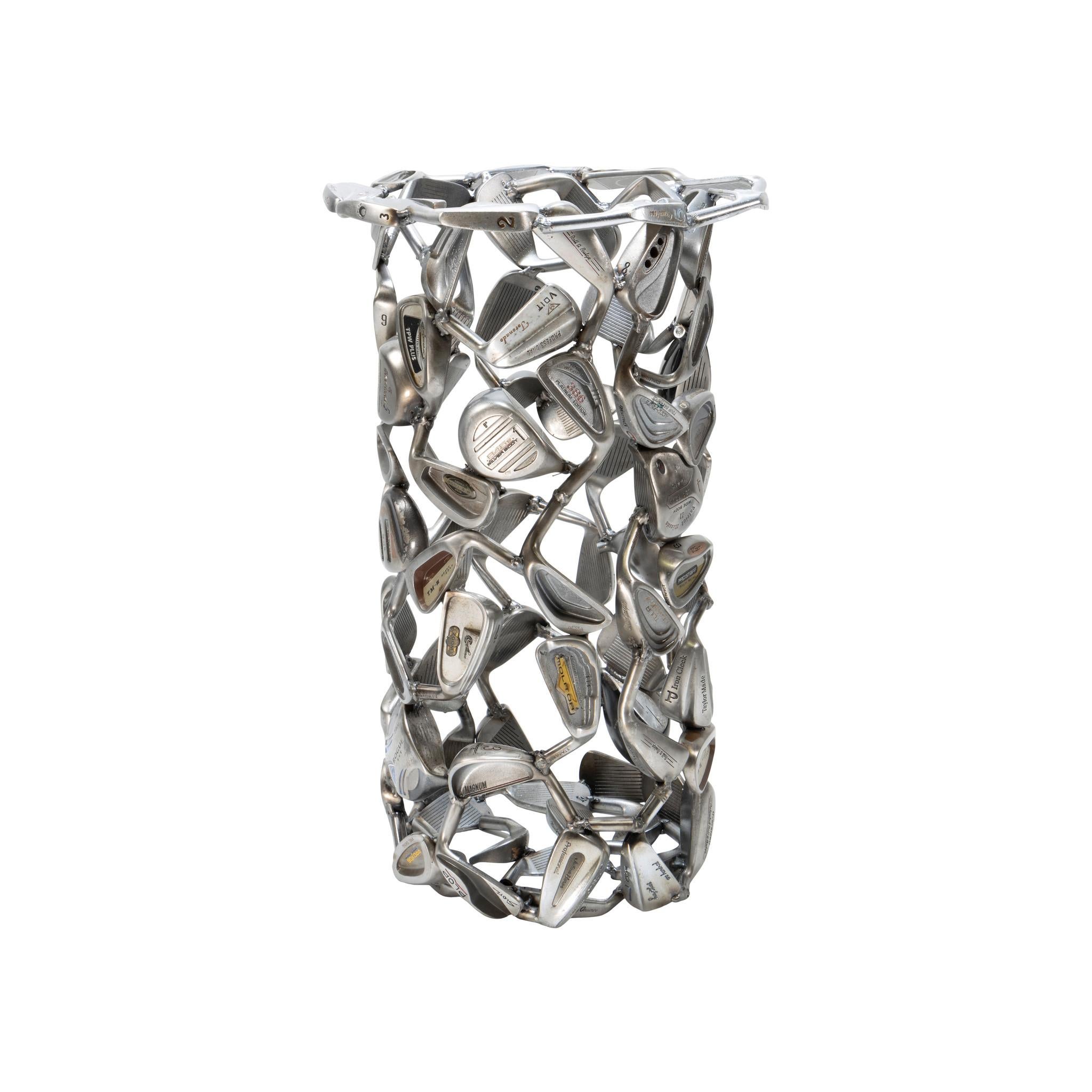 Welded golf club umbrella stand made of 85 golf club heads. Very nice and solid piece, great for the golfer in your life. Also available as a side table with glass top (listed under item number AG2135B) or with vintage clubs included (listed under