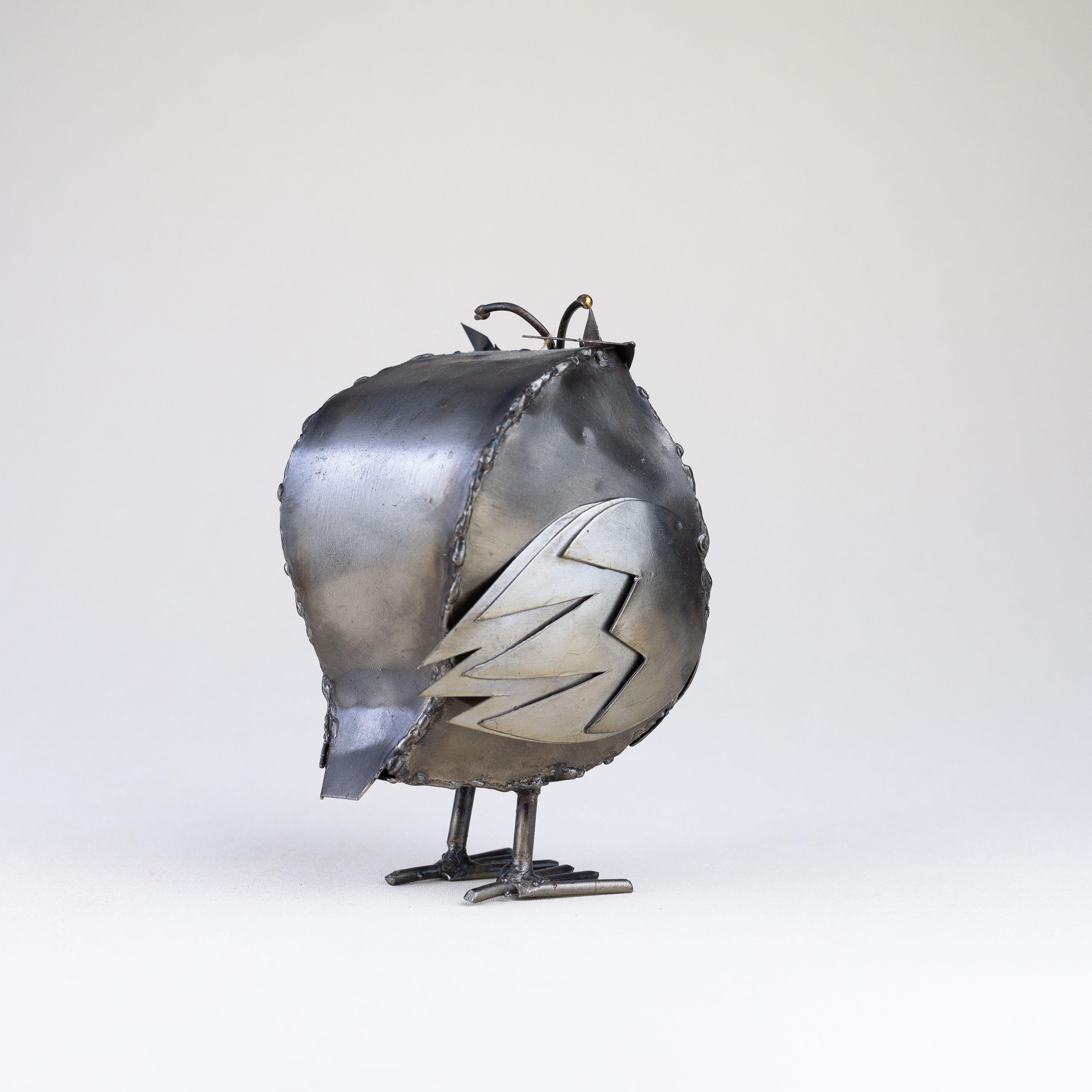 Welded Owl Metal Sculpture, France 1970s.

Handcrafted sculpture, composed of various metal pieces welded together.

A nice piece of folk art with a lovely patina !

Note : On the right side, there are one or two glue drips that might haven't been