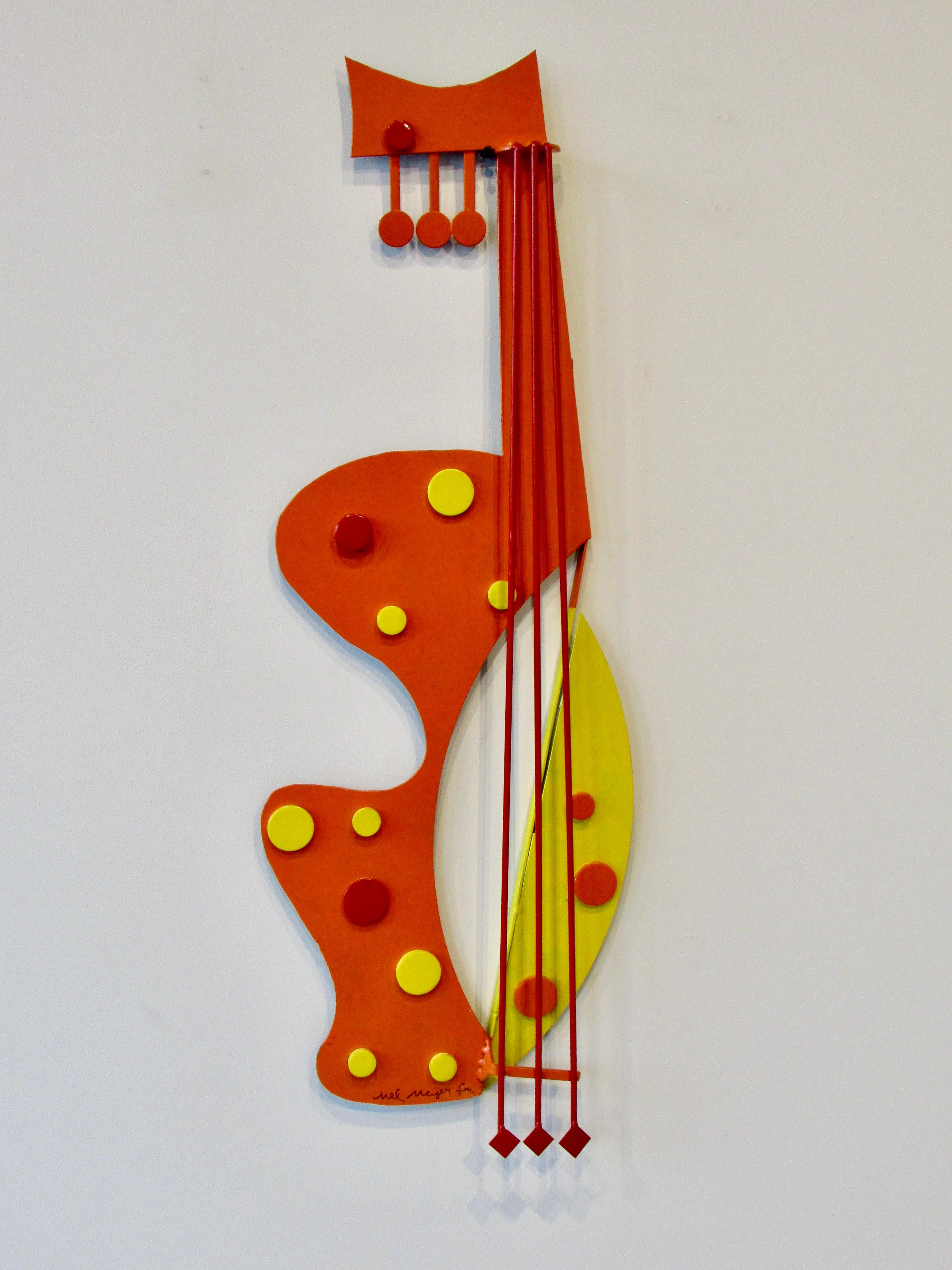 Cut steel components welded together to form an abstract guitar image. Lacquered in orange and yellow.