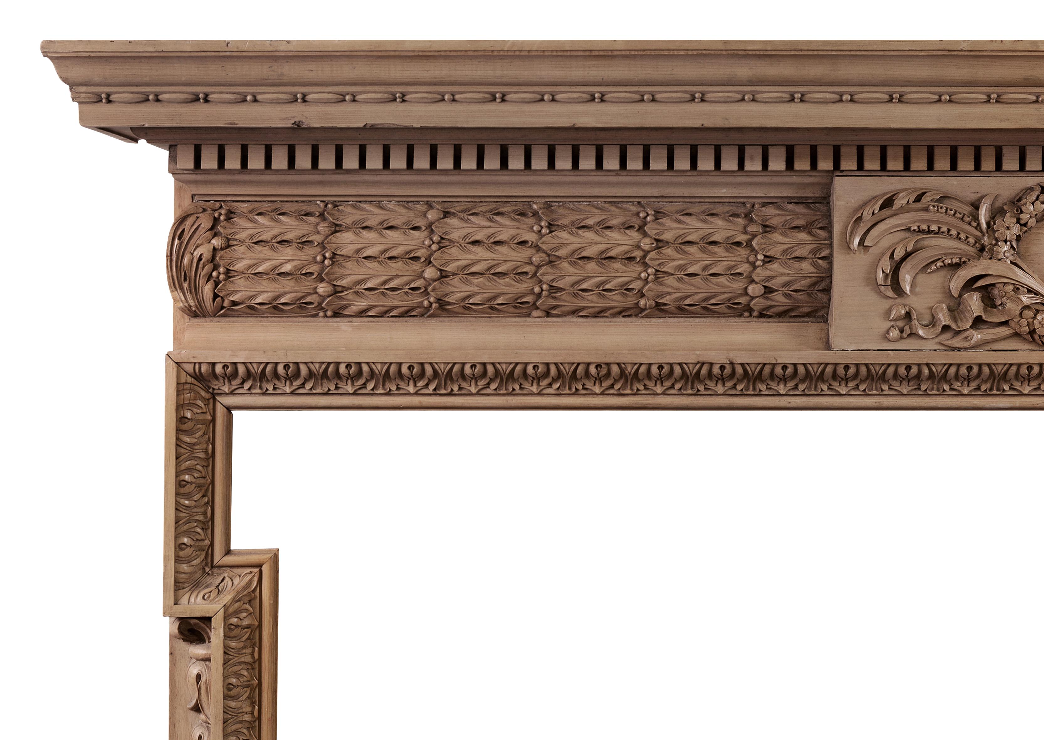 Georgian Well Carved English Pine Fireplace with Barrel Frieze & Oak Leaves For Sale