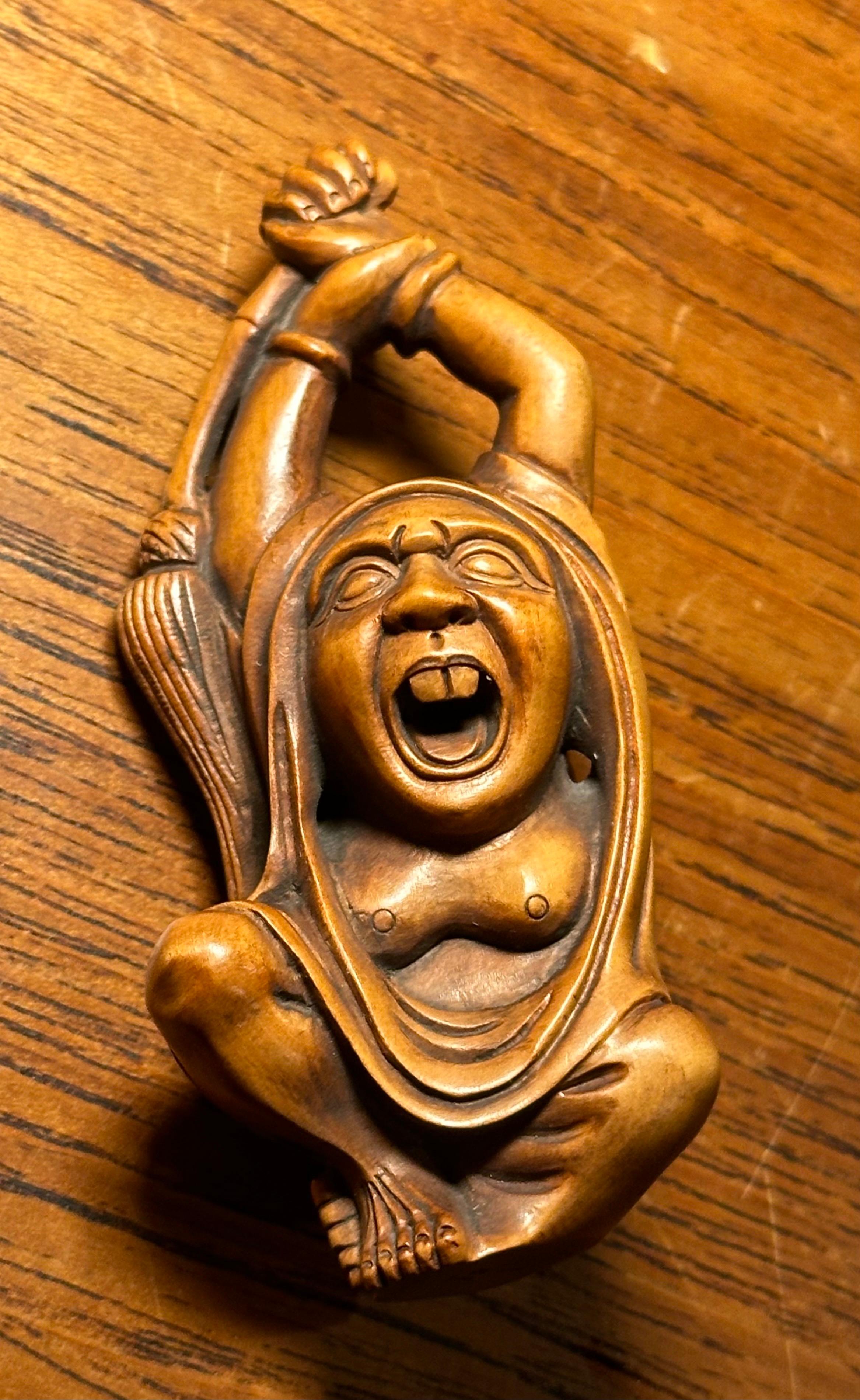 20th Century Well-Carved Japanese Boxwood Netsuke of Daruma Holding Whisk by Ishikawa
