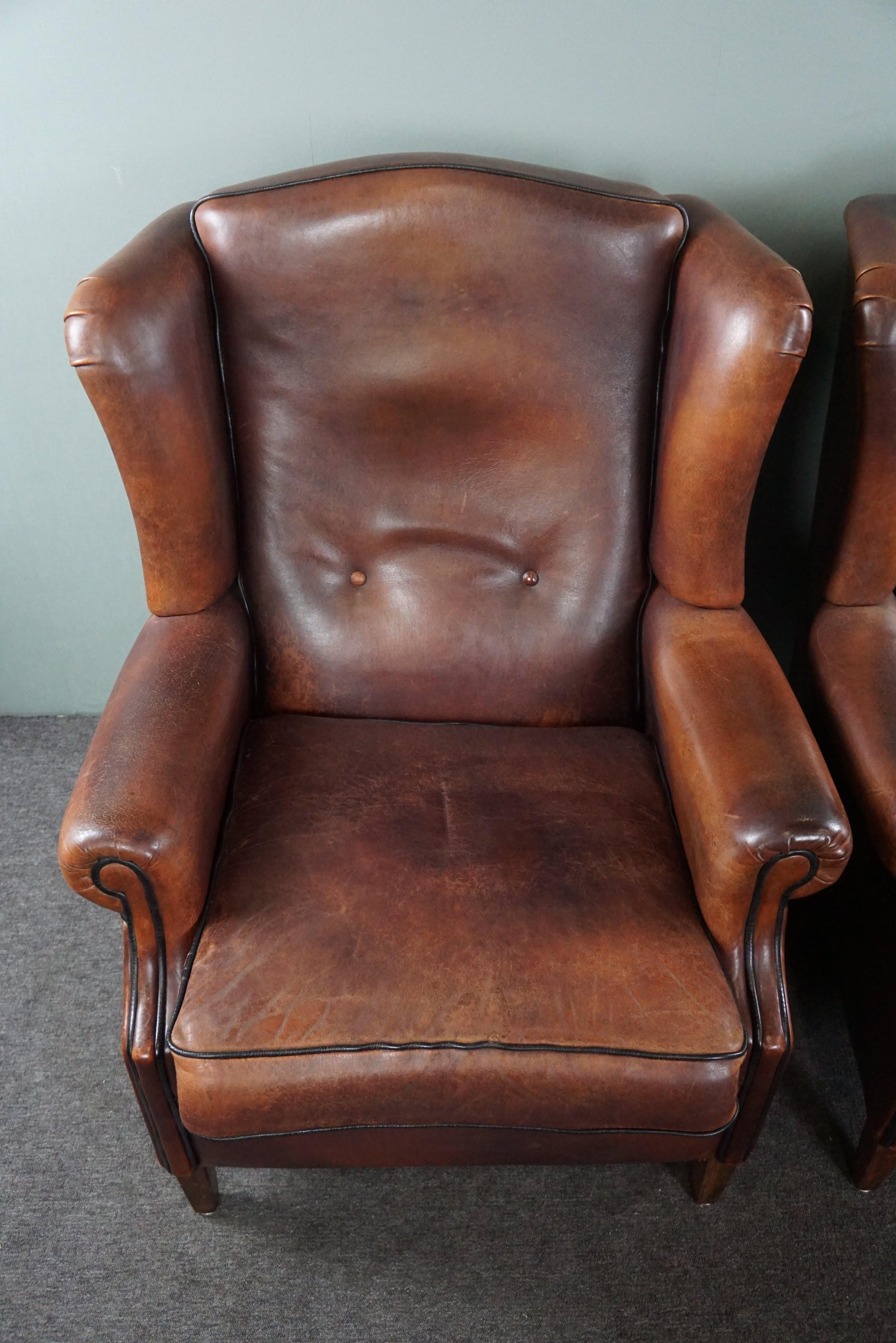 Well-fitting set of 2 sheep leather wing chairs In Good Condition For Sale In Harderwijk, NL