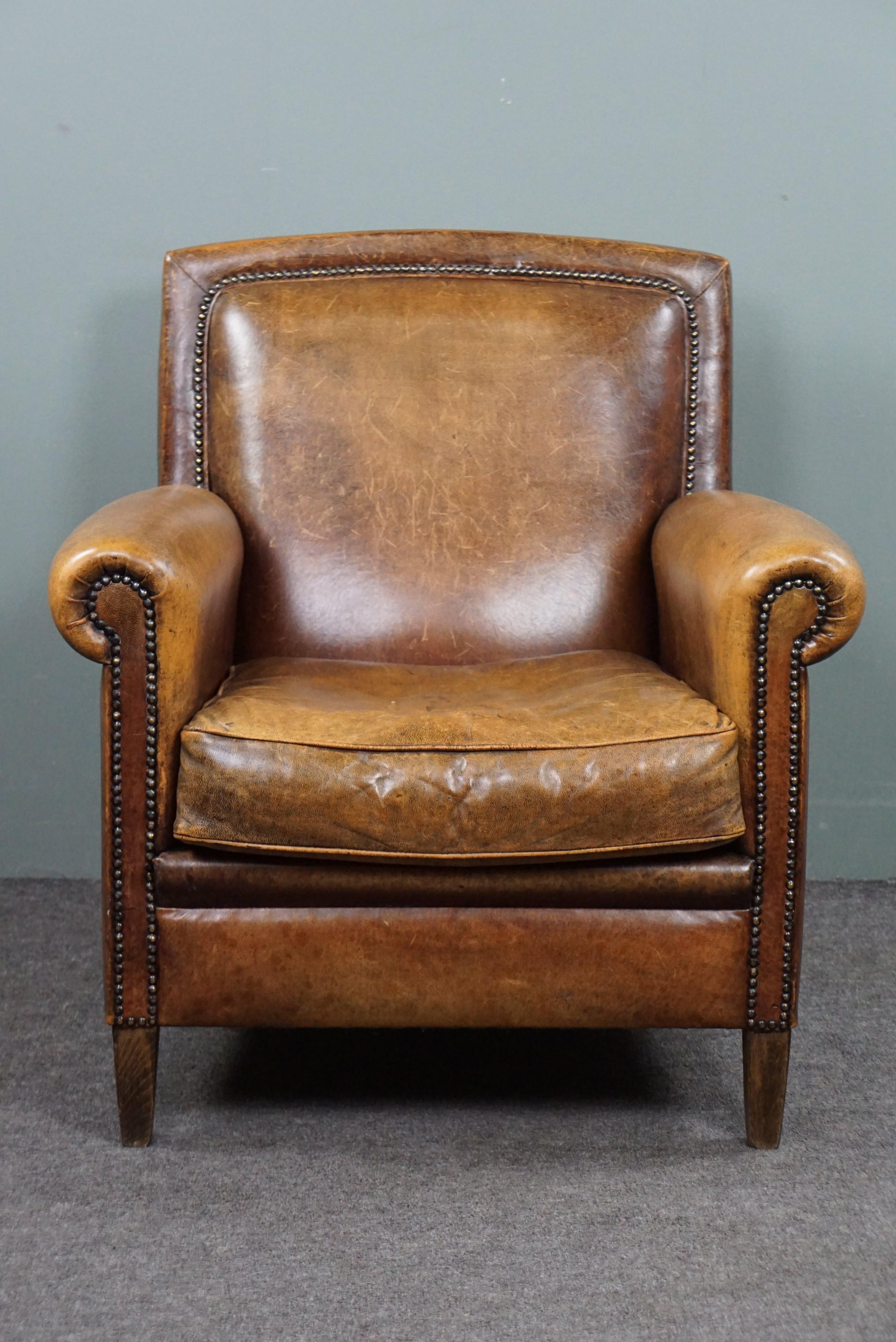 Offered is this well-fitting sheepskin leather fauteuil. This beautiful sheepskin leather armchair/fauteuil is exquisite in color, form, and size, providing excellent comfort and a premium look and feel. With its rich and vibrant colors, lovely
