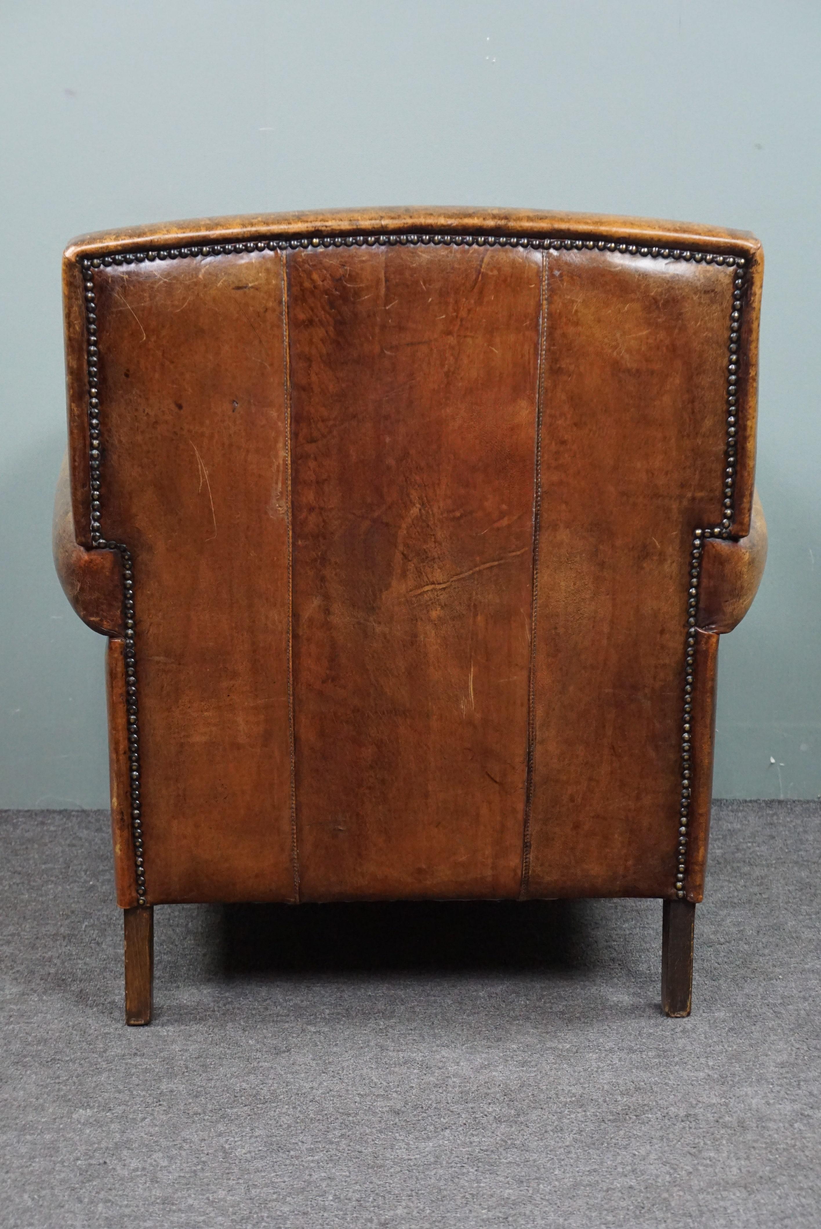 Late 20th Century Well-fitting Sheepskin Leather Armchair/Fauteuil. For Sale