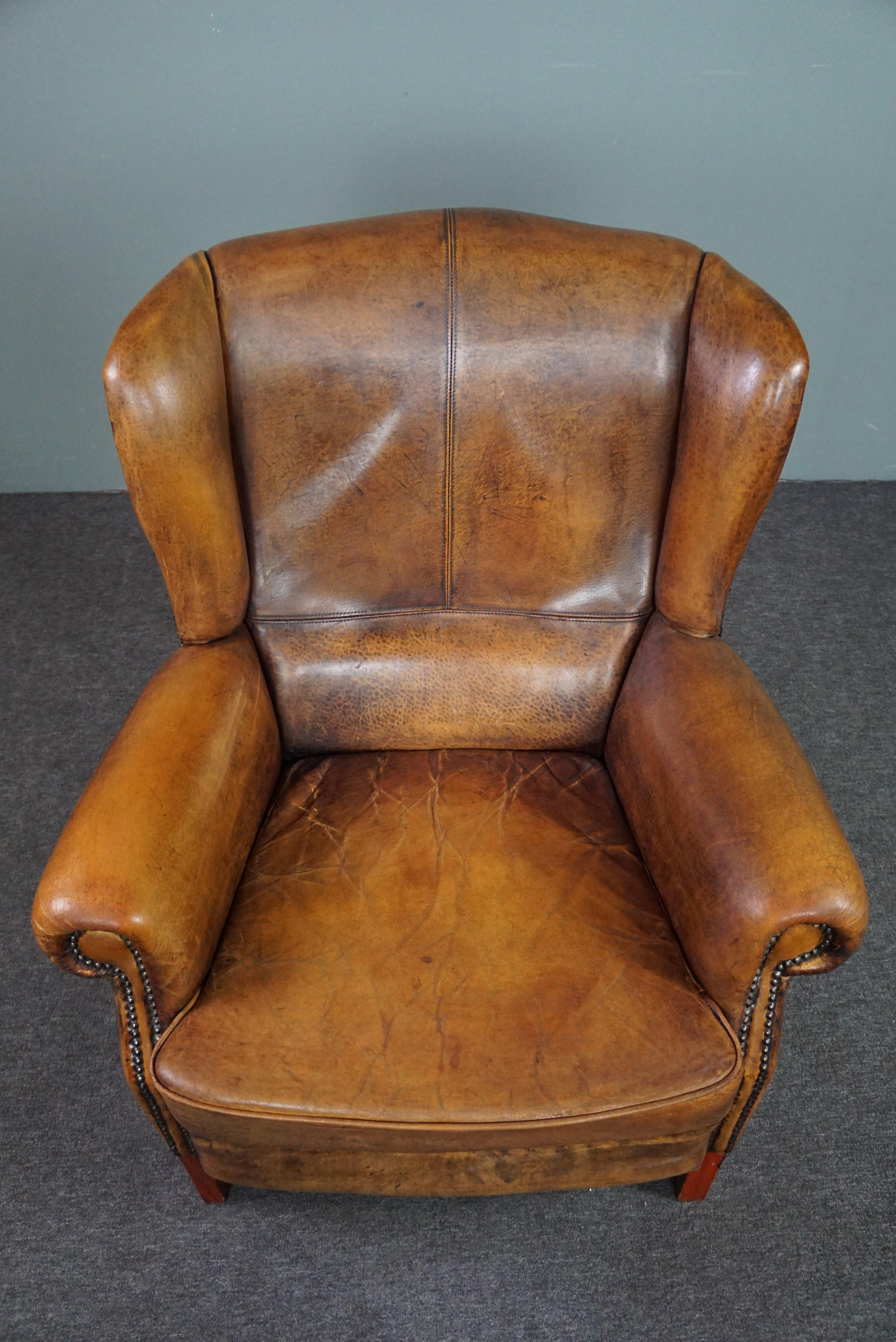 Contemporary Well-fitting sheepskin leather wing chair For Sale