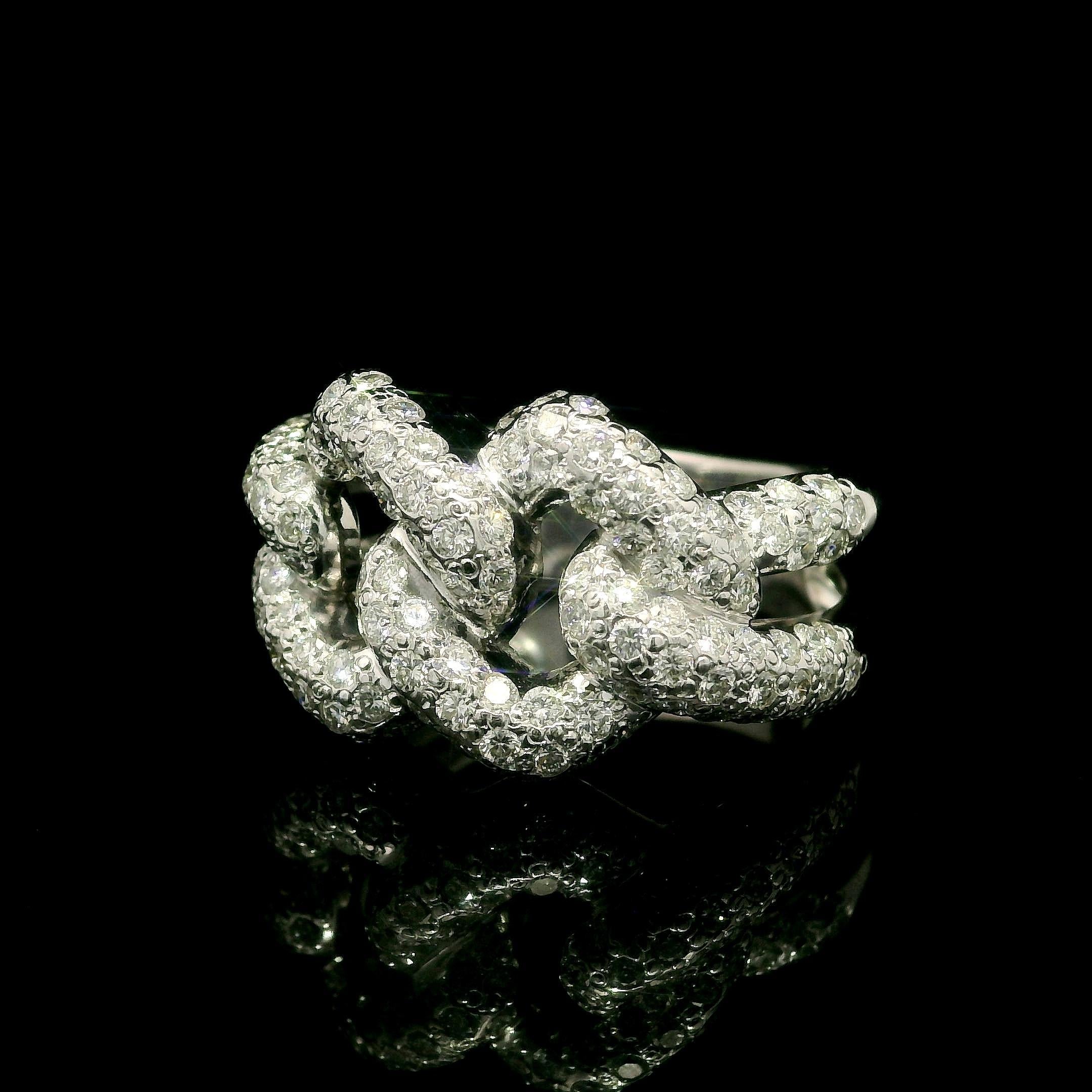 --Stone(s):
Numerous Natural Genuine Diamonds - Round Brilliant Cut - Pave Set - Very Nice Brilliant White Color - 2.40ctw (approx.)

Material: Solid 18k White Gold 
Weight: 11.09 Grams
Ring Size:  7.0 (fitted on finger, we can custom size this