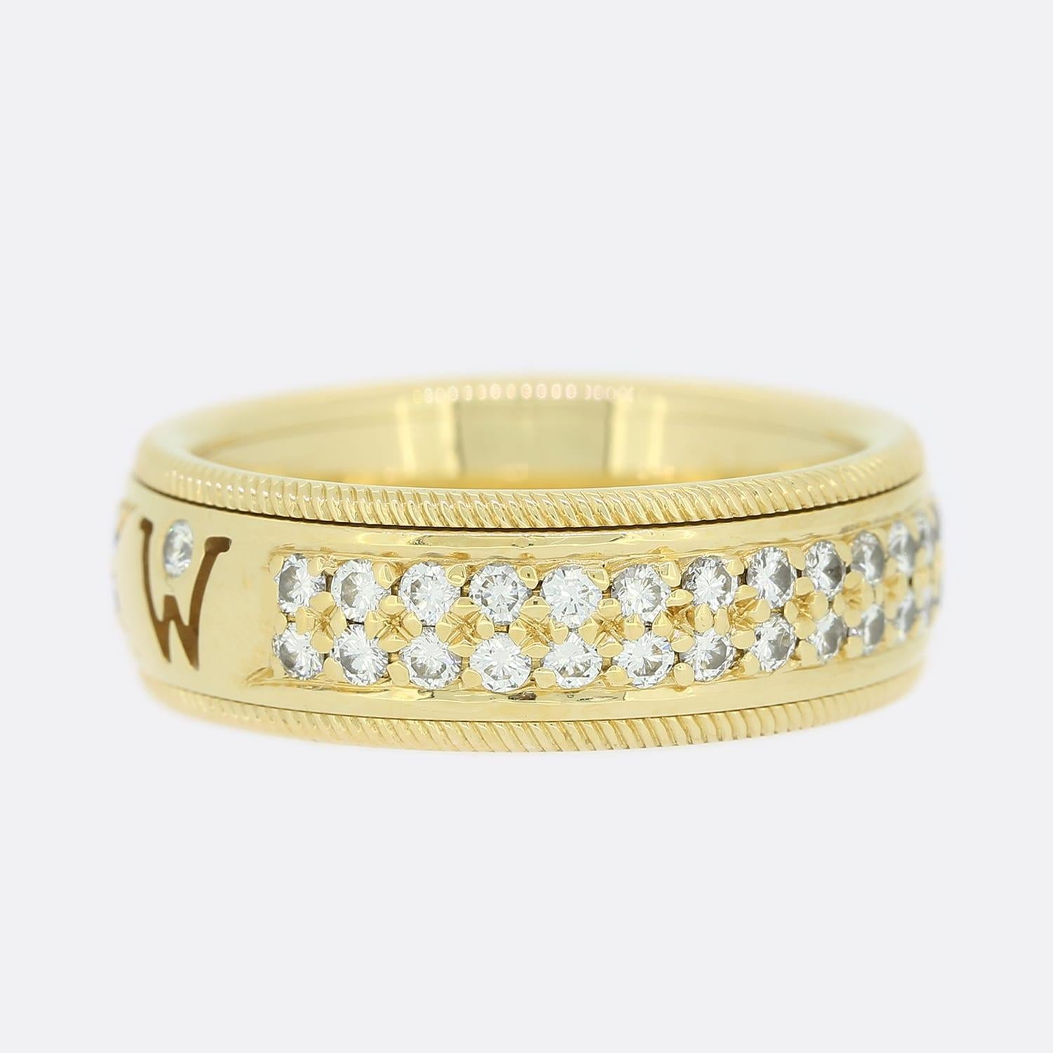 This is an 18ct yellow gold ring from the German jewellery designers Wellendorff. The ring features 2 sections which allows the band to freely move whilst the shank stays still and comfortable on the finger. The ring features over 0.96 carats of