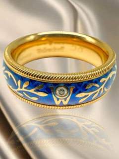 Wellendorff ring in 18-carat yellow gold with diamonds and cold enamel