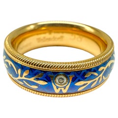 Anillo Wellendorff de oro amarillo de 18 quilates con diamantes y esmalte en frío