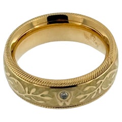 Anello a fascia cinetica in oro giallo Wellendorff con smalto e diamanti