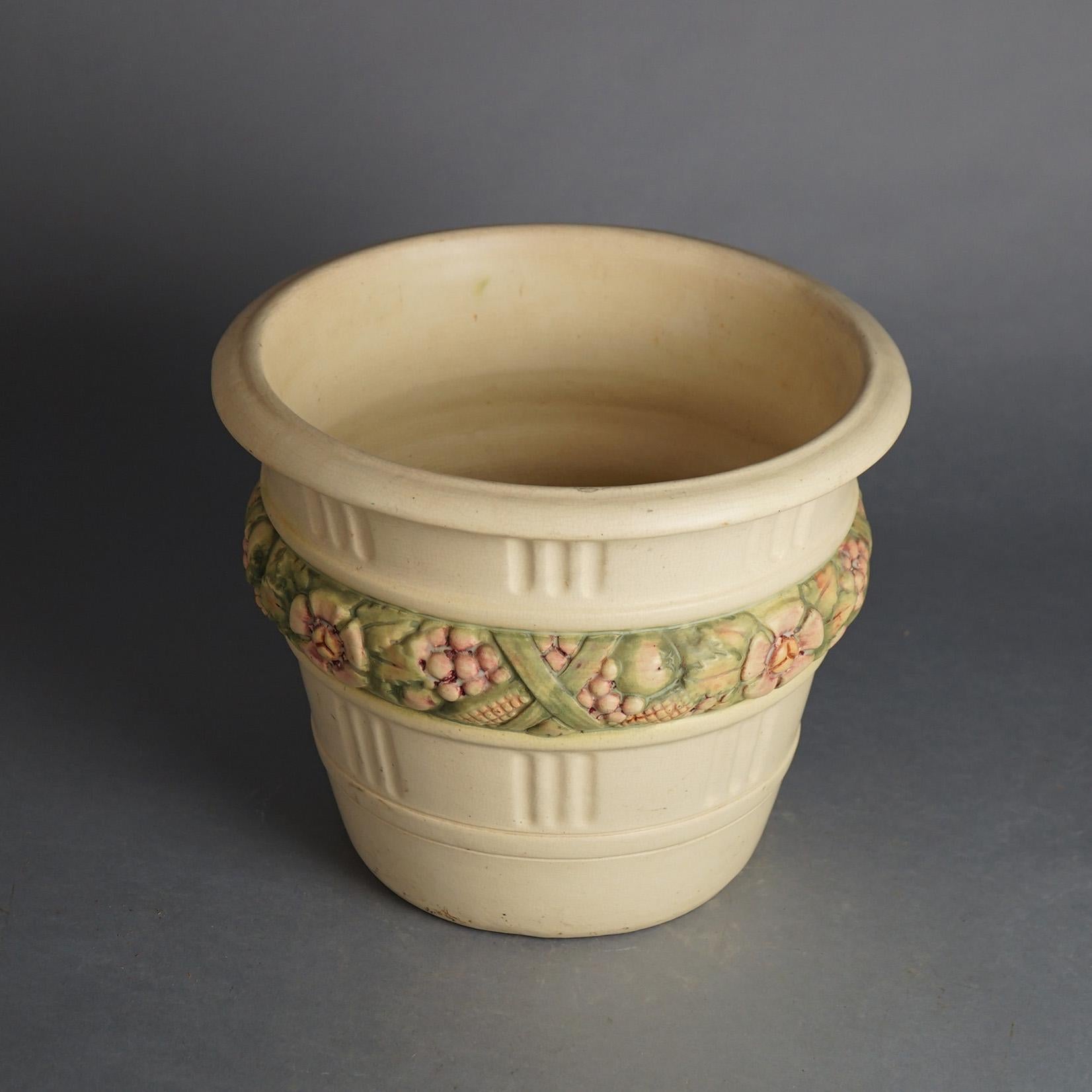 Weller (attr) Art Pottery Jardiniere with Floral Band 20thC

Measures- 11.5''H x 13.75''W x 13.75''D