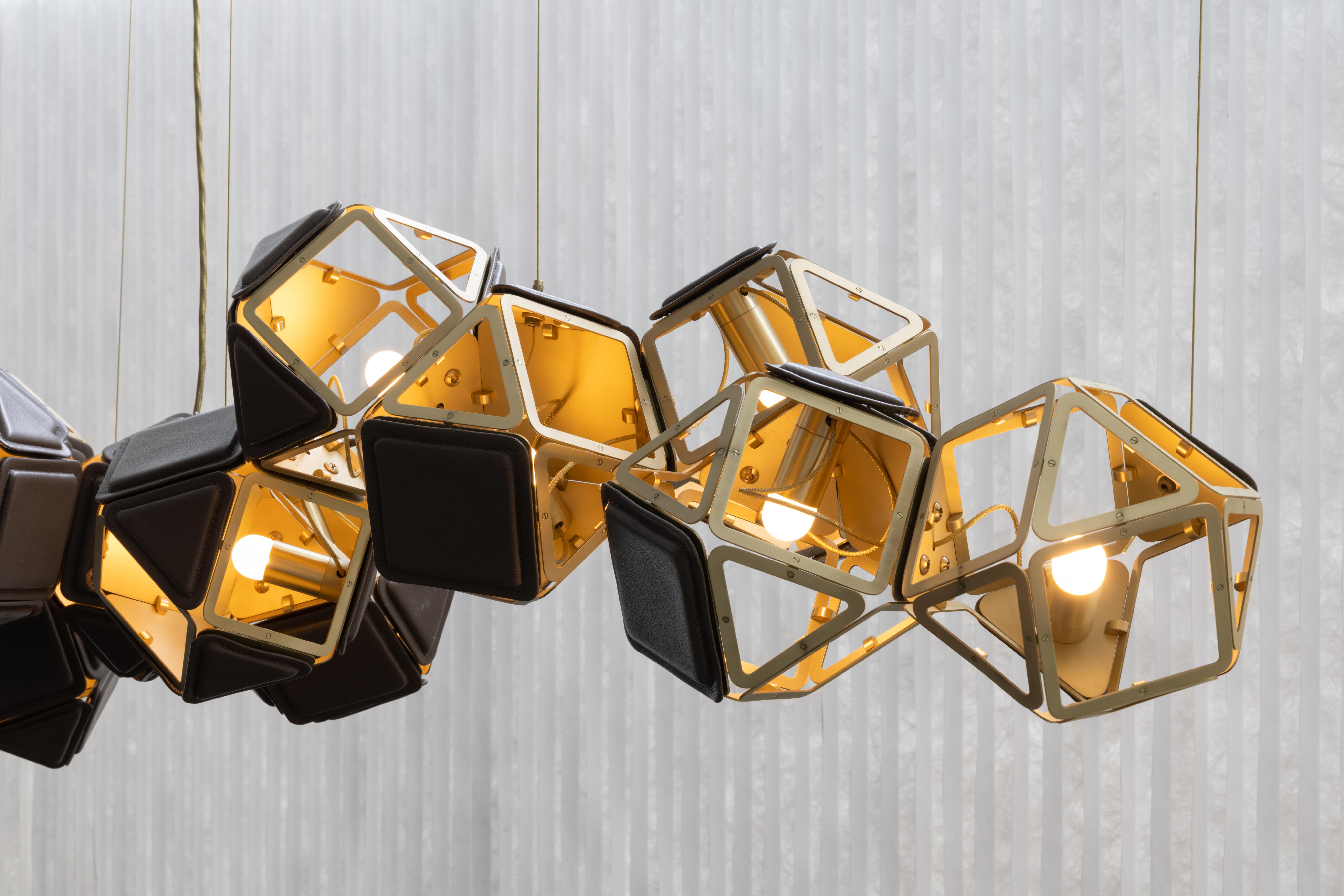 The Welles Long Chandelier 16 by Sybille de Margerie floats effortlessly, adding a sense of movement and dimension to any space. The capsule collection comprises a Long, Central and Vertical Chandelier, as well as a Triple Pendant and Single